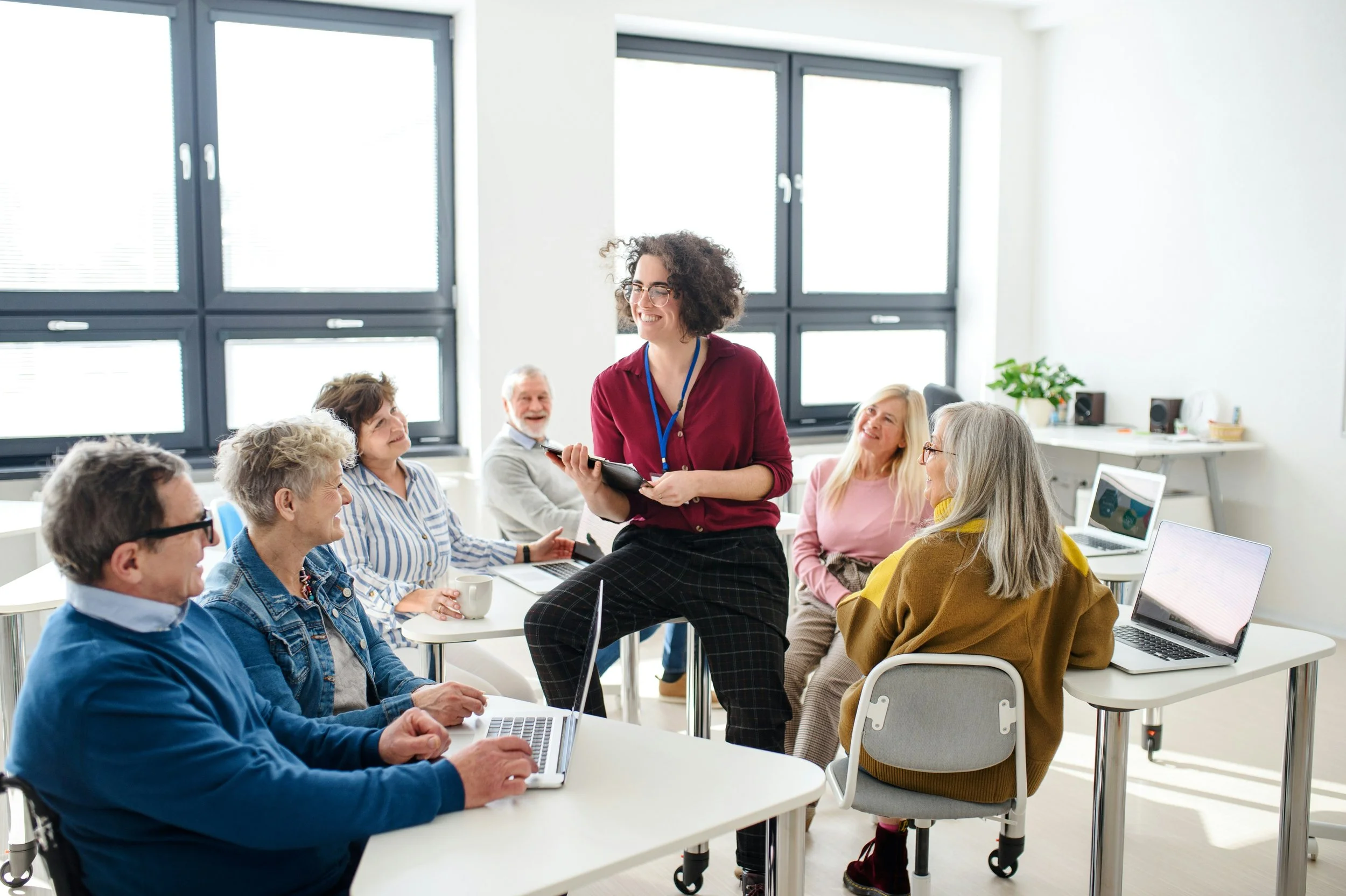 Team members of different generations working together in a healthy work environment