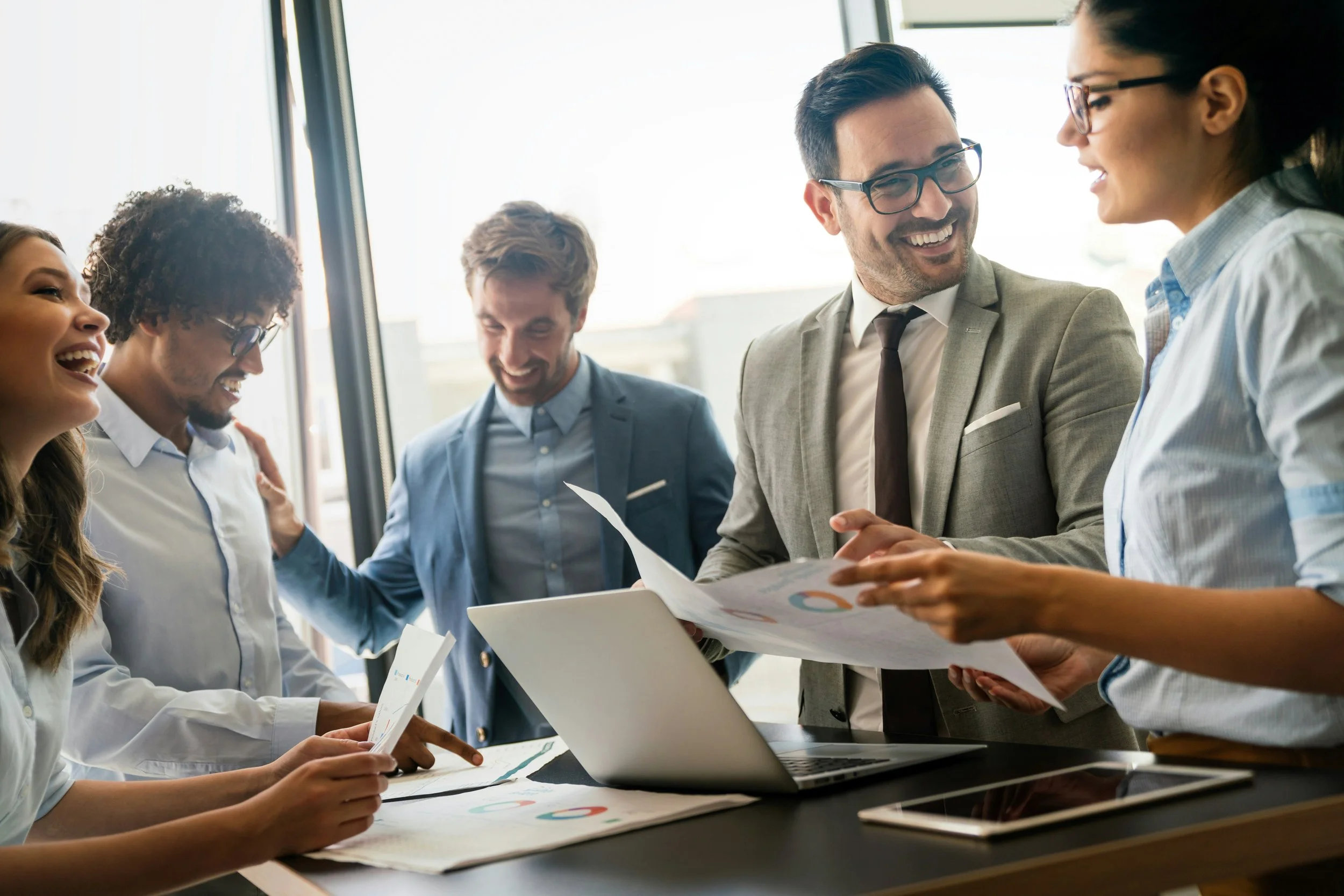 Leaders working together in a high-trust environment, using their human skills to excel in the age of AI