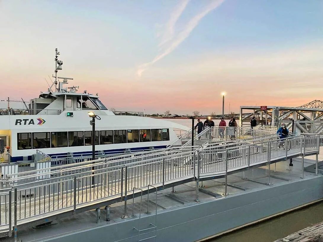 Boarding the ferry on the East Bank near the aquarium.