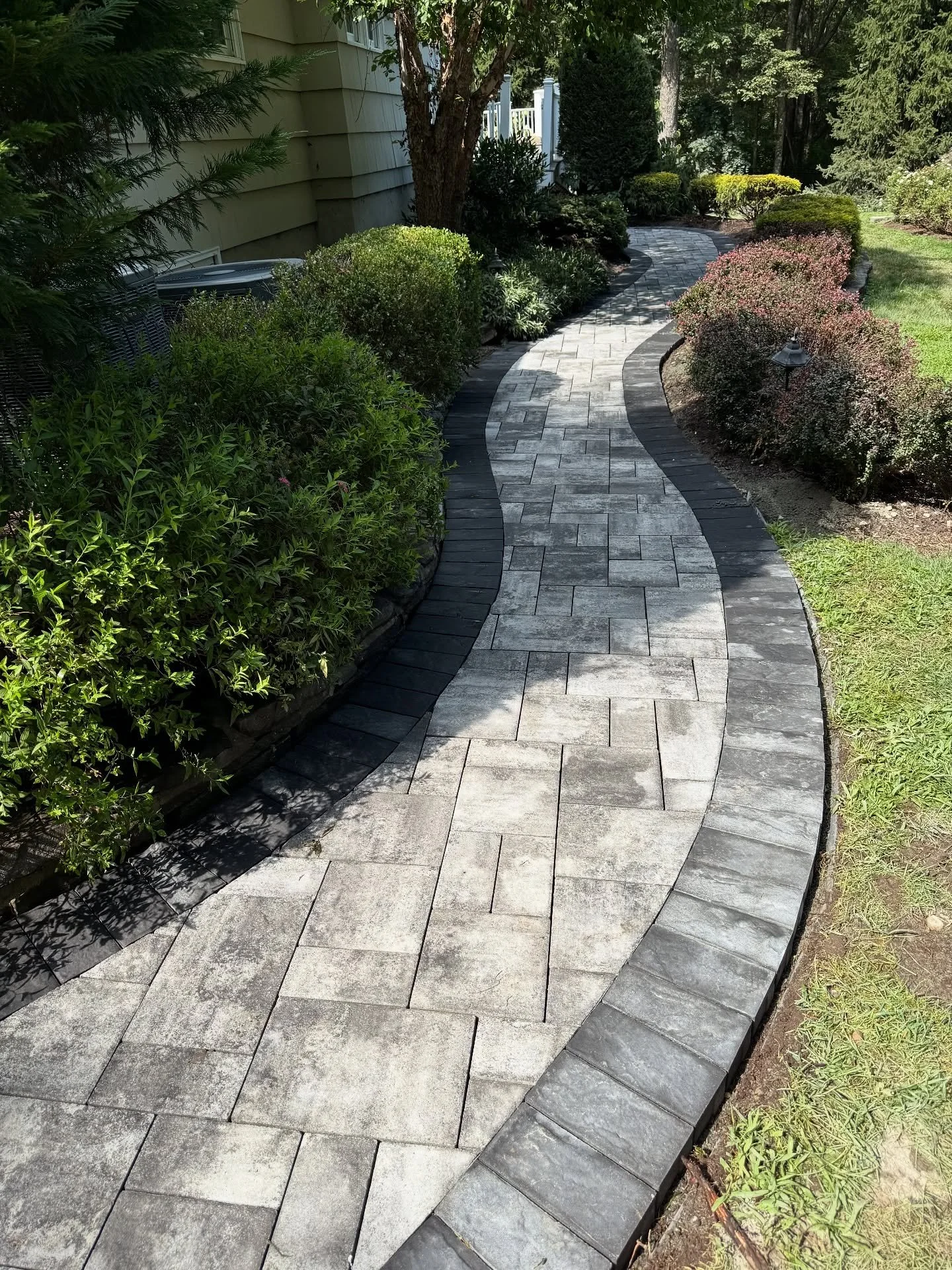 A fresh path forward &mdash; a clean, inviting walkway that welcomes you home every day! 🧱Swipe to see the before! This simple design upgrade changes any outdoor space! #bruinandsons #walkway #