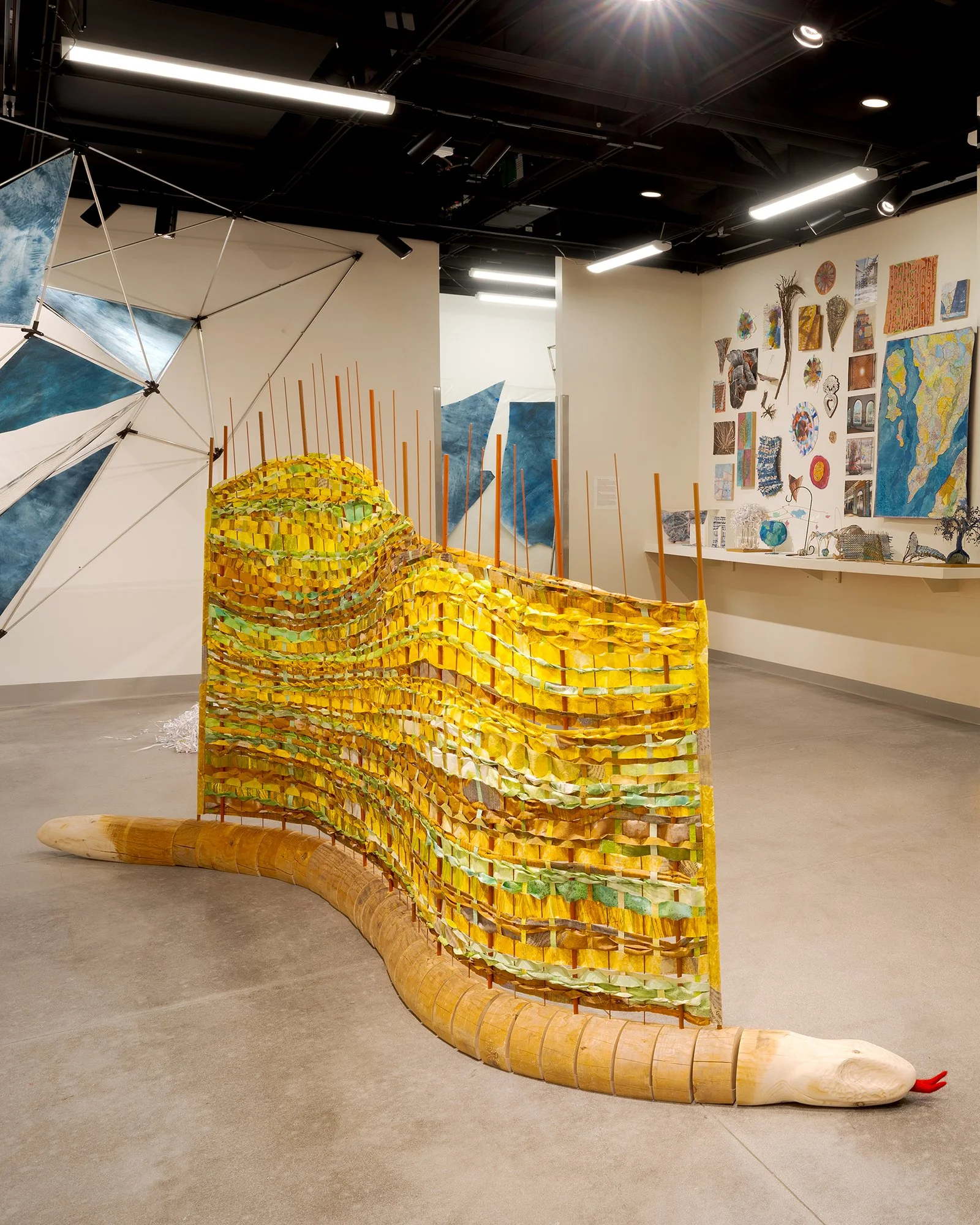 Joyce Dallal, Snake in the Grass, wood, metal, painted collaged fabrics, 6.5'x15'x7
