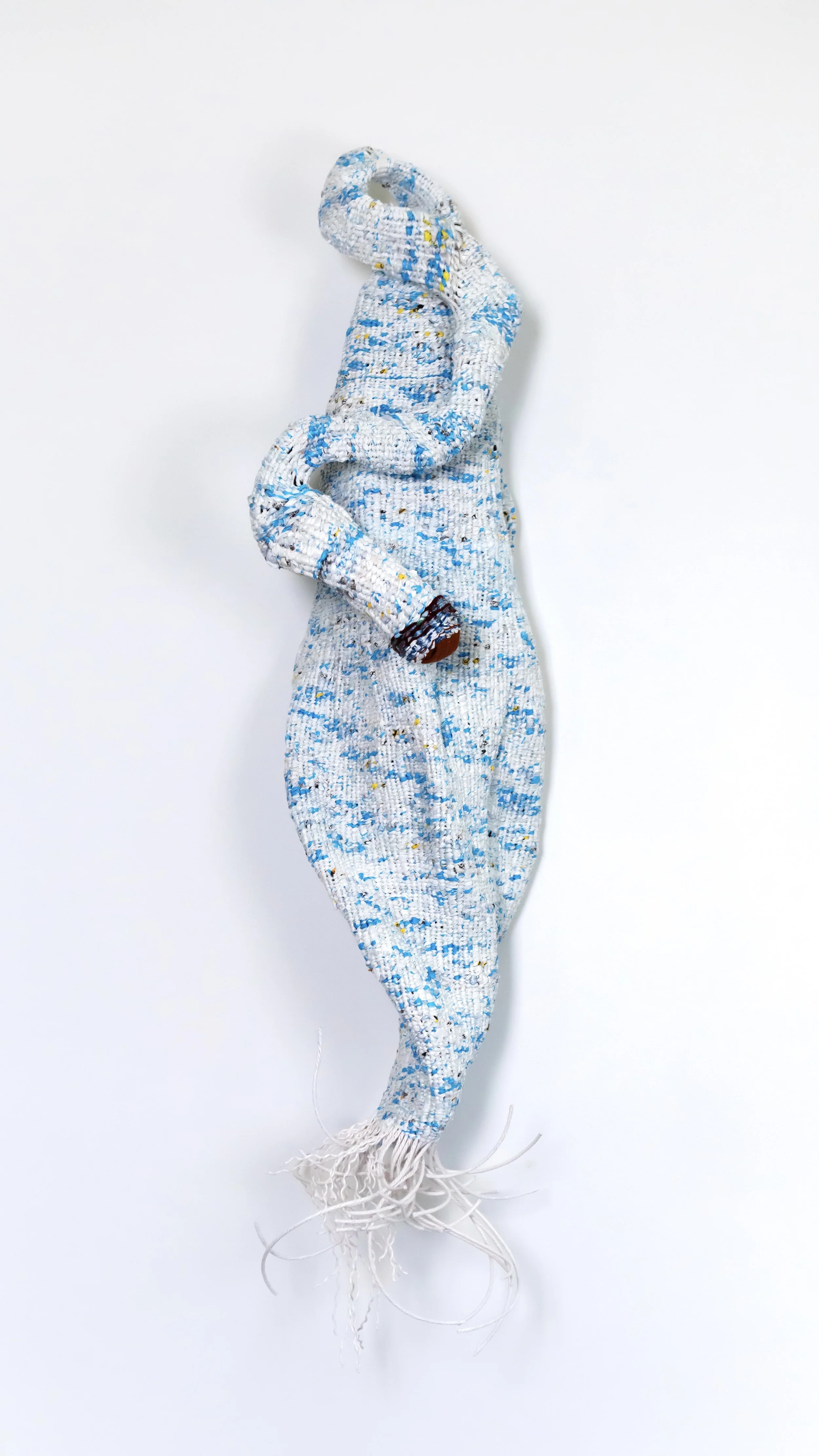 Elise Vazelakis, Driving With My Eyes Closed 2, Amazon envelopes, T-shirt yarn, Danish paper
cord, stuffed with single-use plastic detritus, 55x12x10"