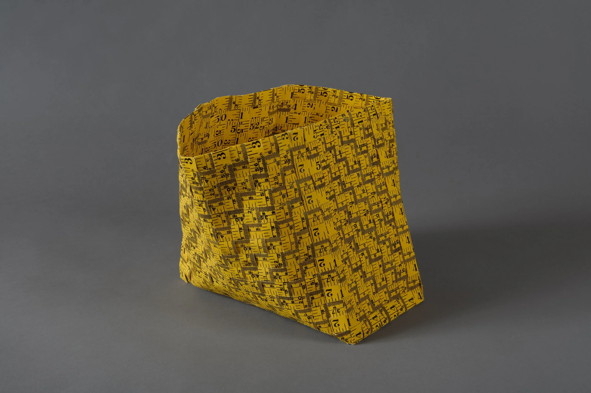 Karyl Sisson, Empty #2 vintage coth tape measures and thread, 15x15x9"