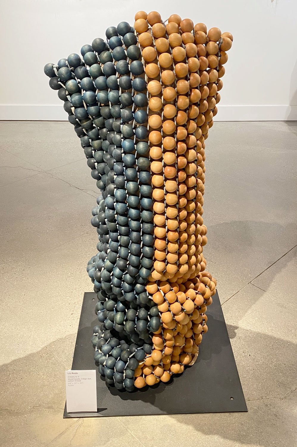 Liz Robb, Creatura II, wood beads, indigo, cotton thread, 48x20x20"