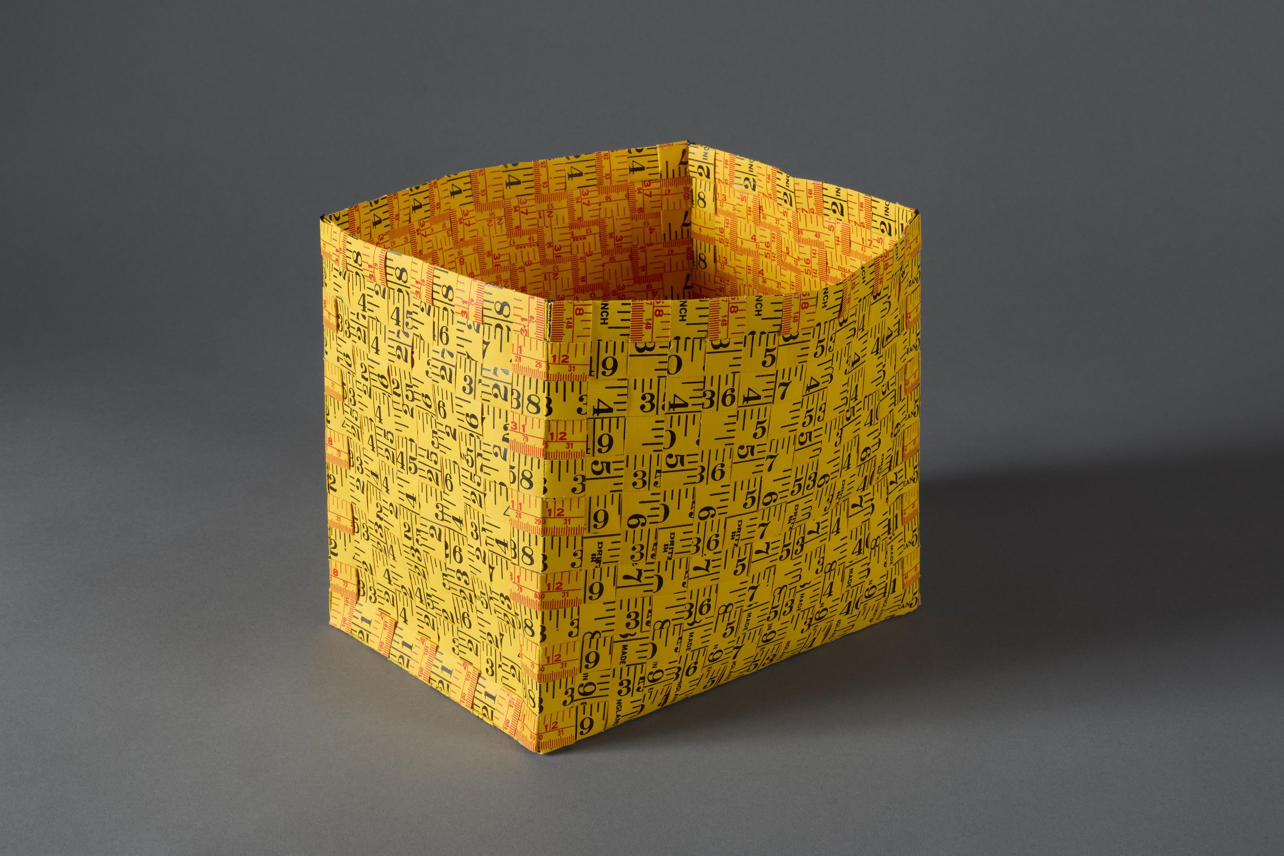 Karyl Sisson, Empty #5 vintage coth tape measures and thread, 15x15x9"