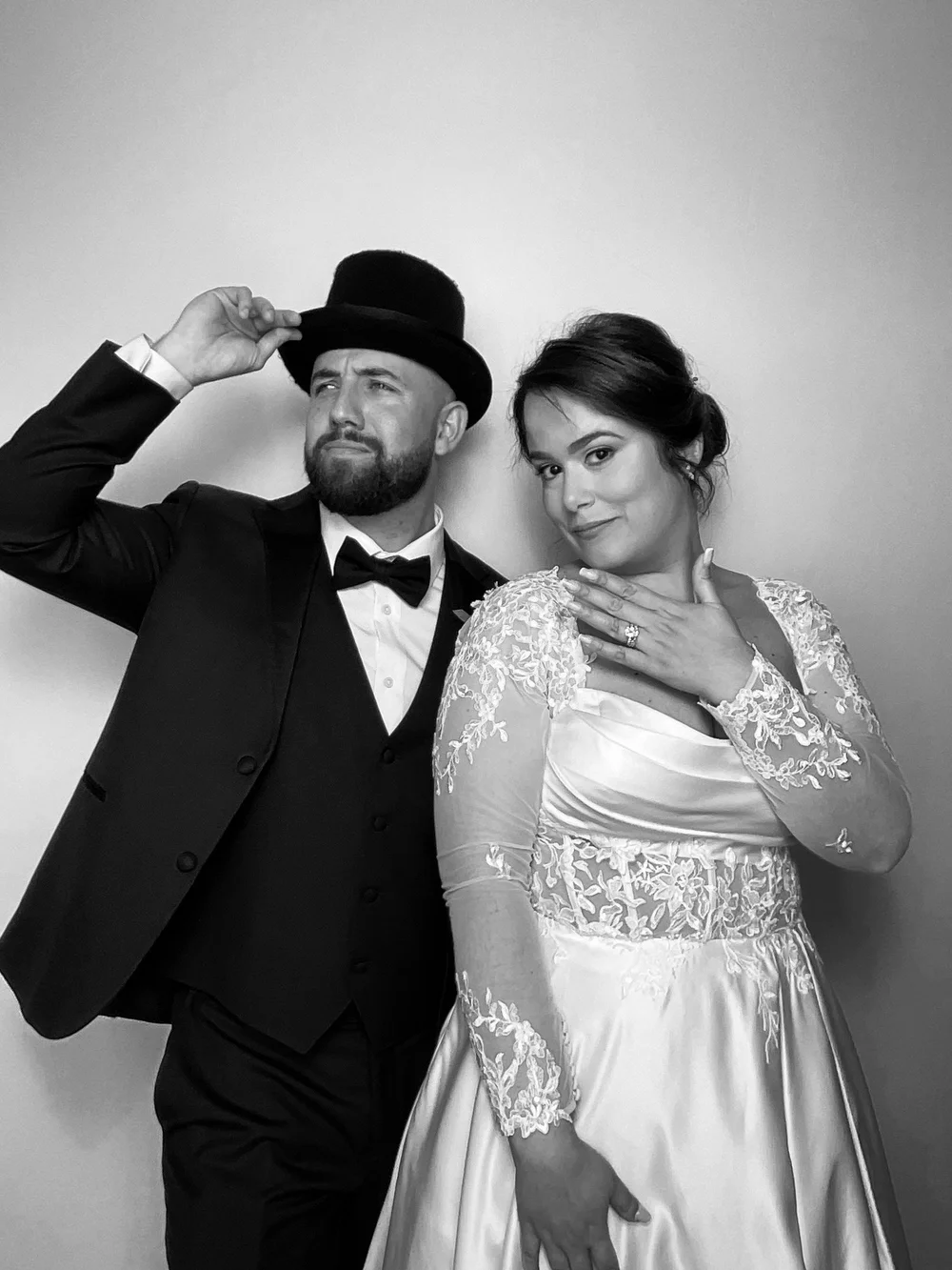 Couple at premium Miami wedding photo booth experience