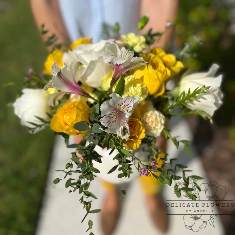 Flower Fiesta flower arrangement with vibrant blooms and playful textures