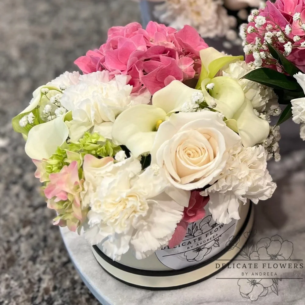 Little Beauty flower arrangement with petite blooms and delicate textures