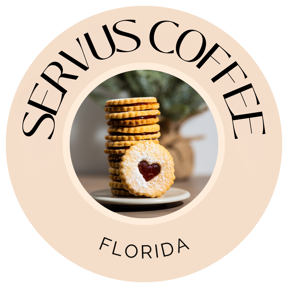 A logo for Servus Coffee, featuring a stack of heart-shaped jam cookies on a plate. The text "Servus Coffee" and "Florida" encircle the image.