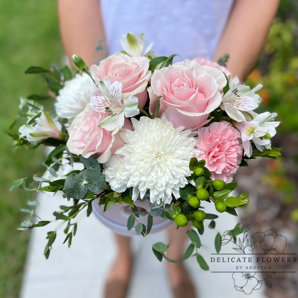 Floral Designer’s Choice custom flower arrangement created with seasonal premium blooms