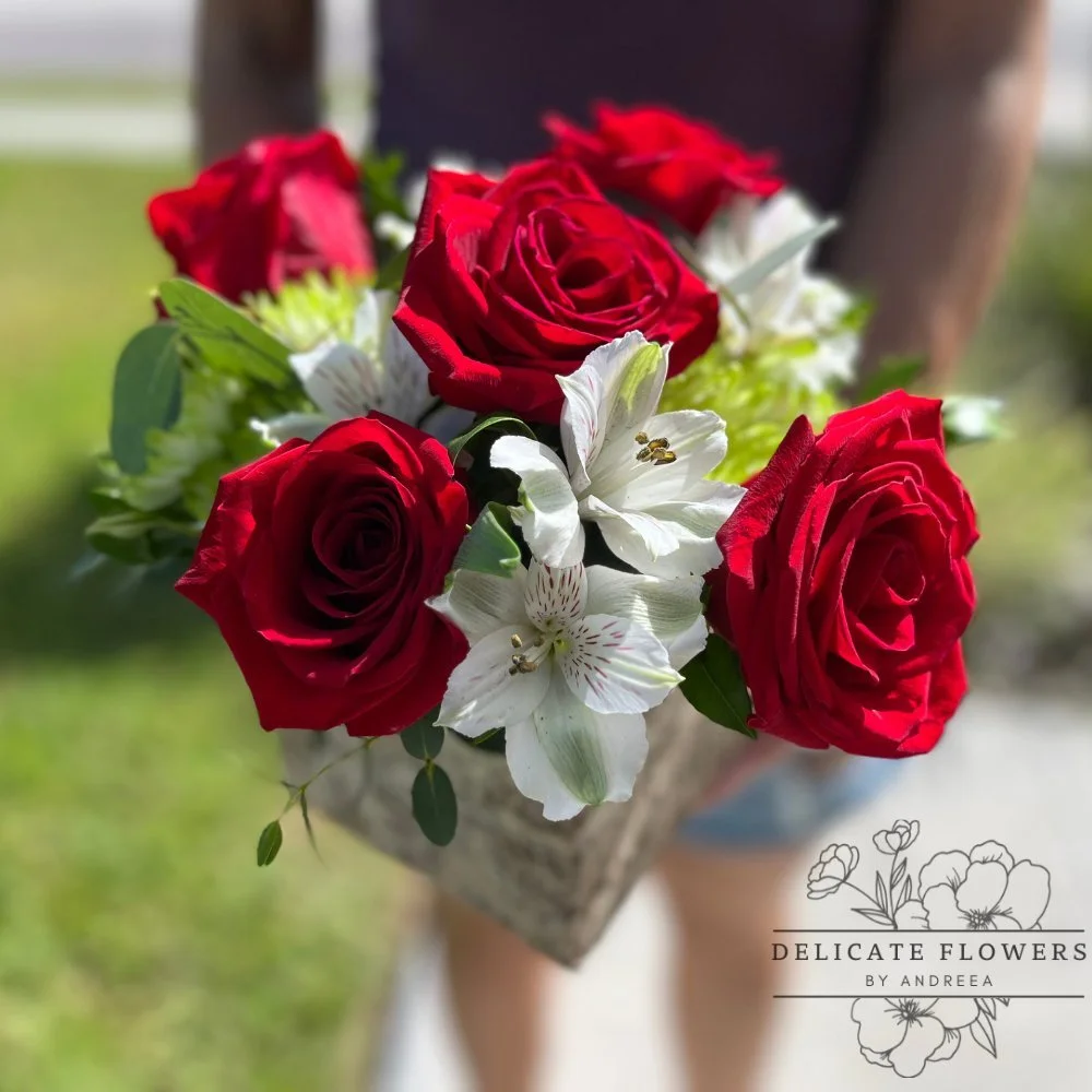 Vivid Joy flower arrangement with red roses, white blooms, and fresh greenery