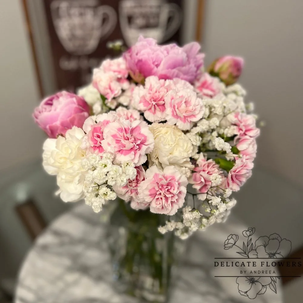Pink Harmony flower arrangement with soft pink blooms and elegant textures