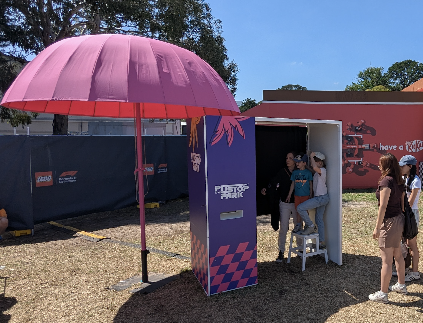 Branded enclosed photo booth for the F1