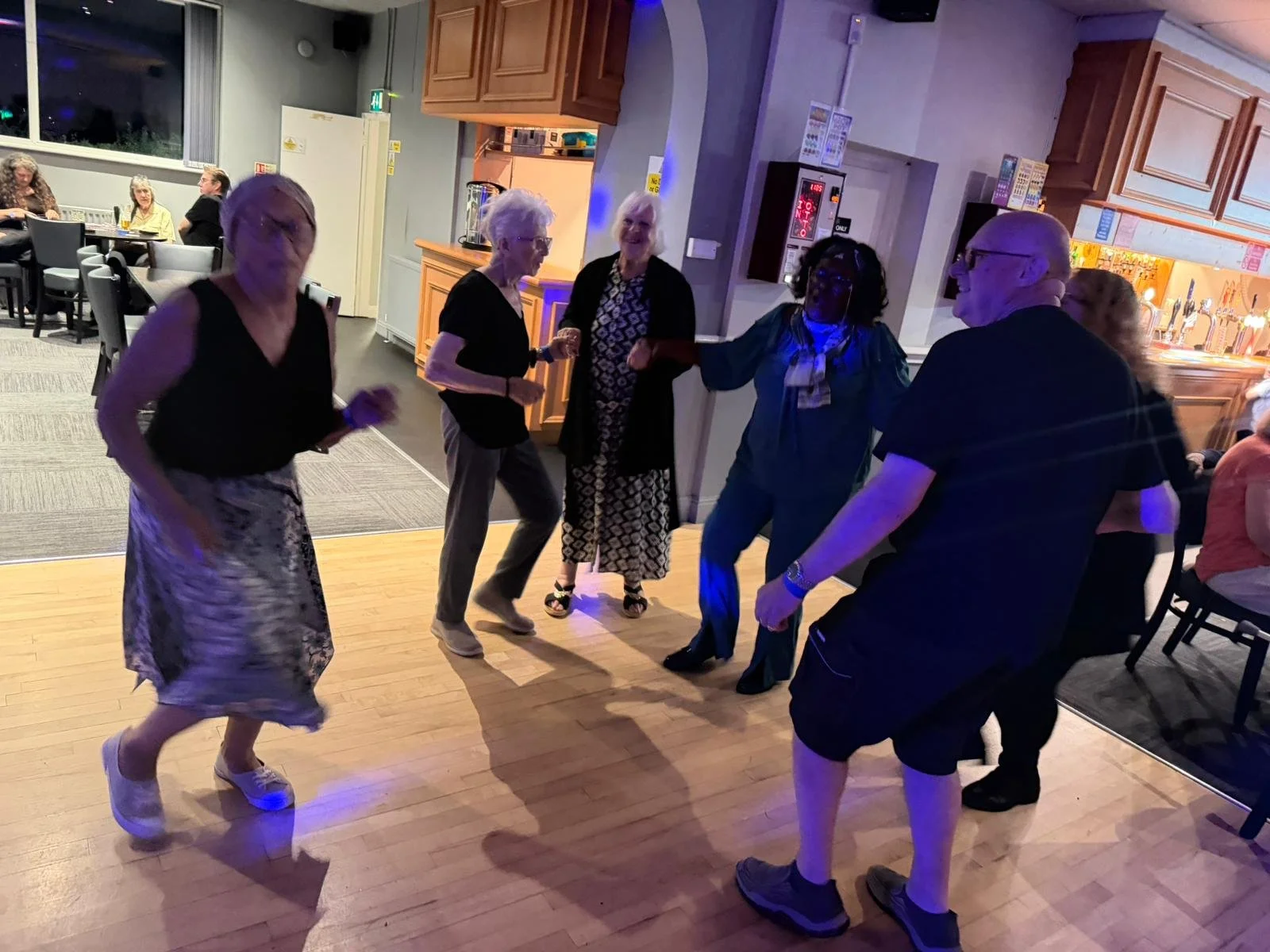 Staff and Volunteers Dancing at a fundraising disco