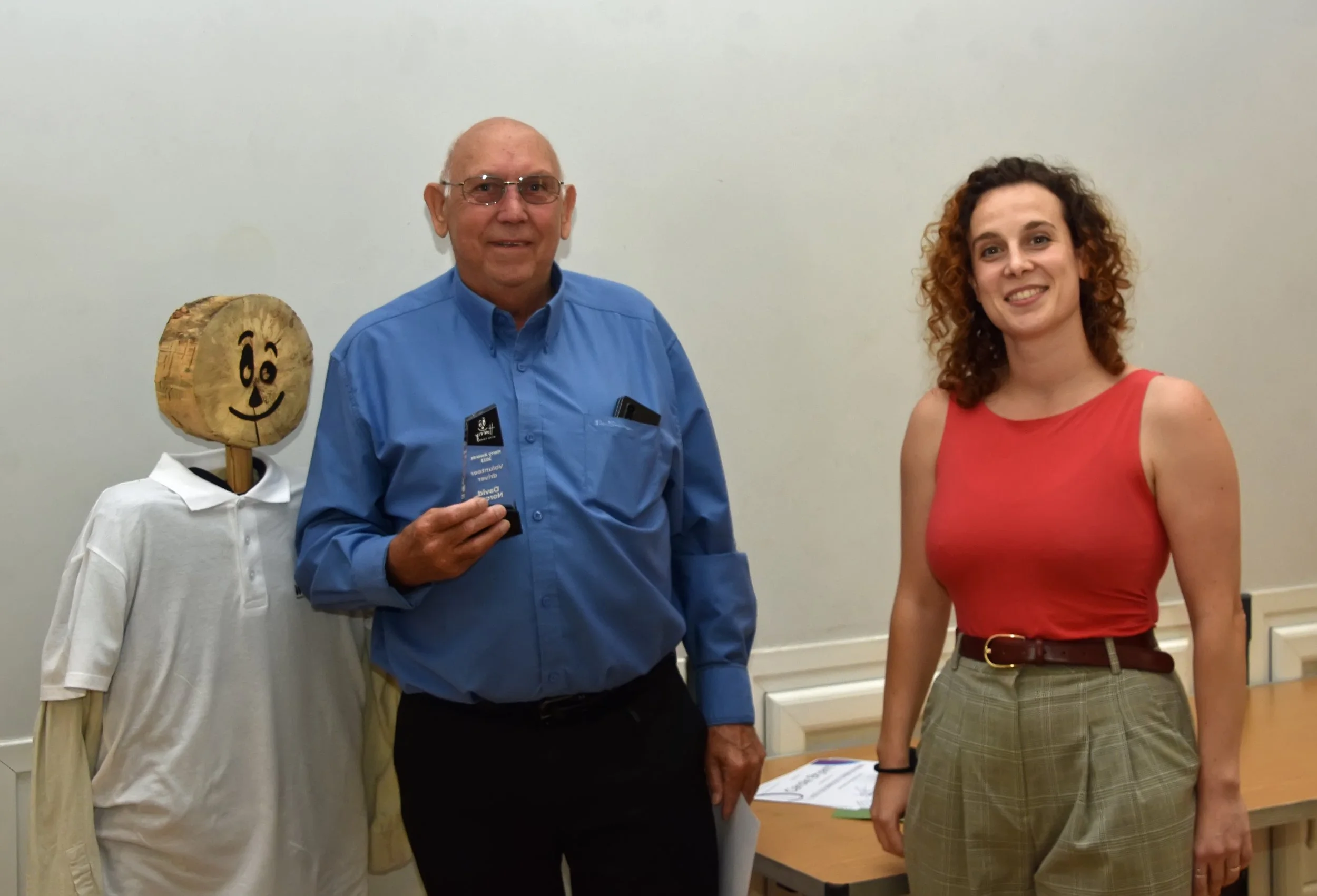 Volunteer Dave receiving his award from the Volunteer Coordinator and Harry as a witness ;)