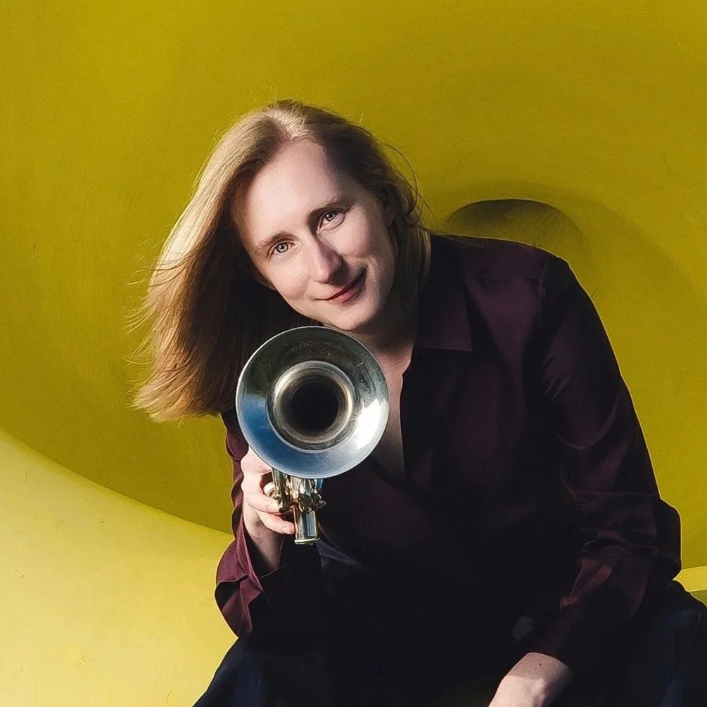 Lucy Humphris holding a trumpet