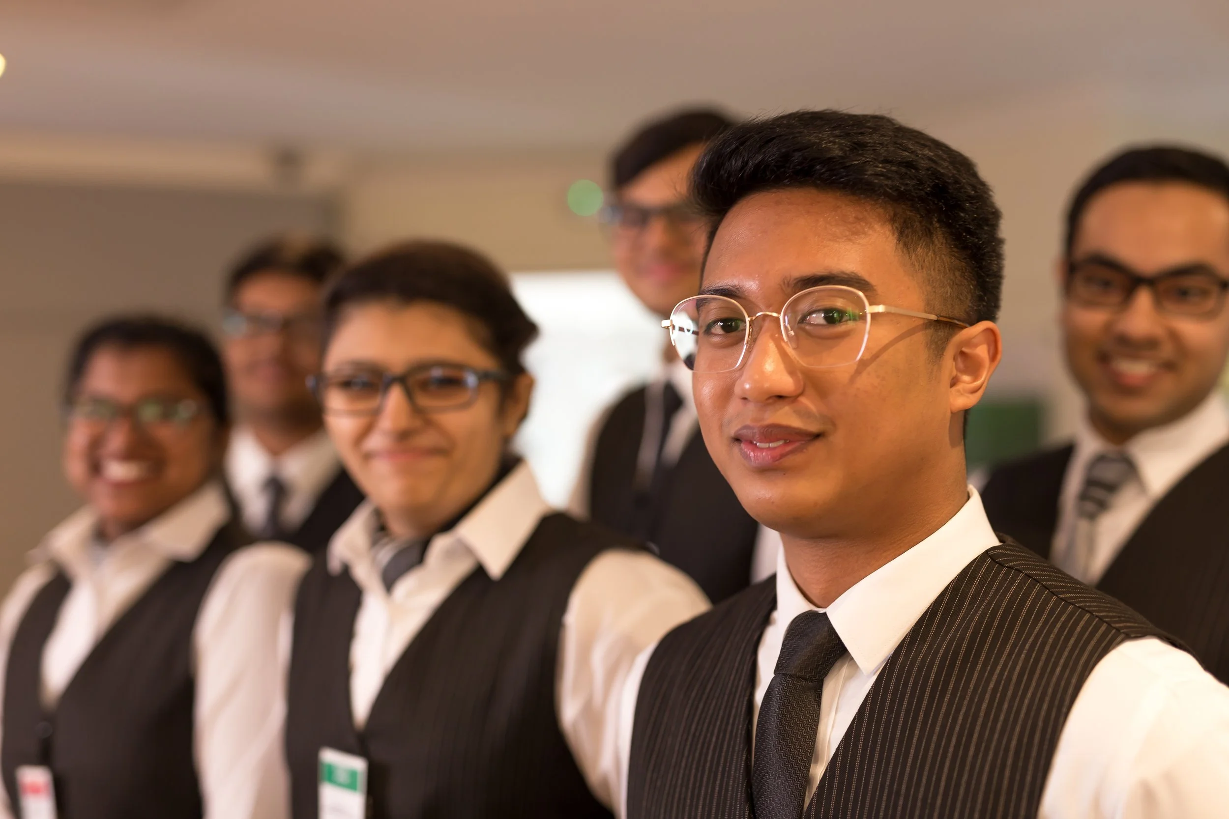 two NHI diploma students smiling