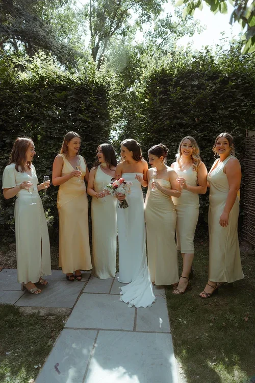 Updown-farmhouse-wedding-flowers-bridesmaids.webp