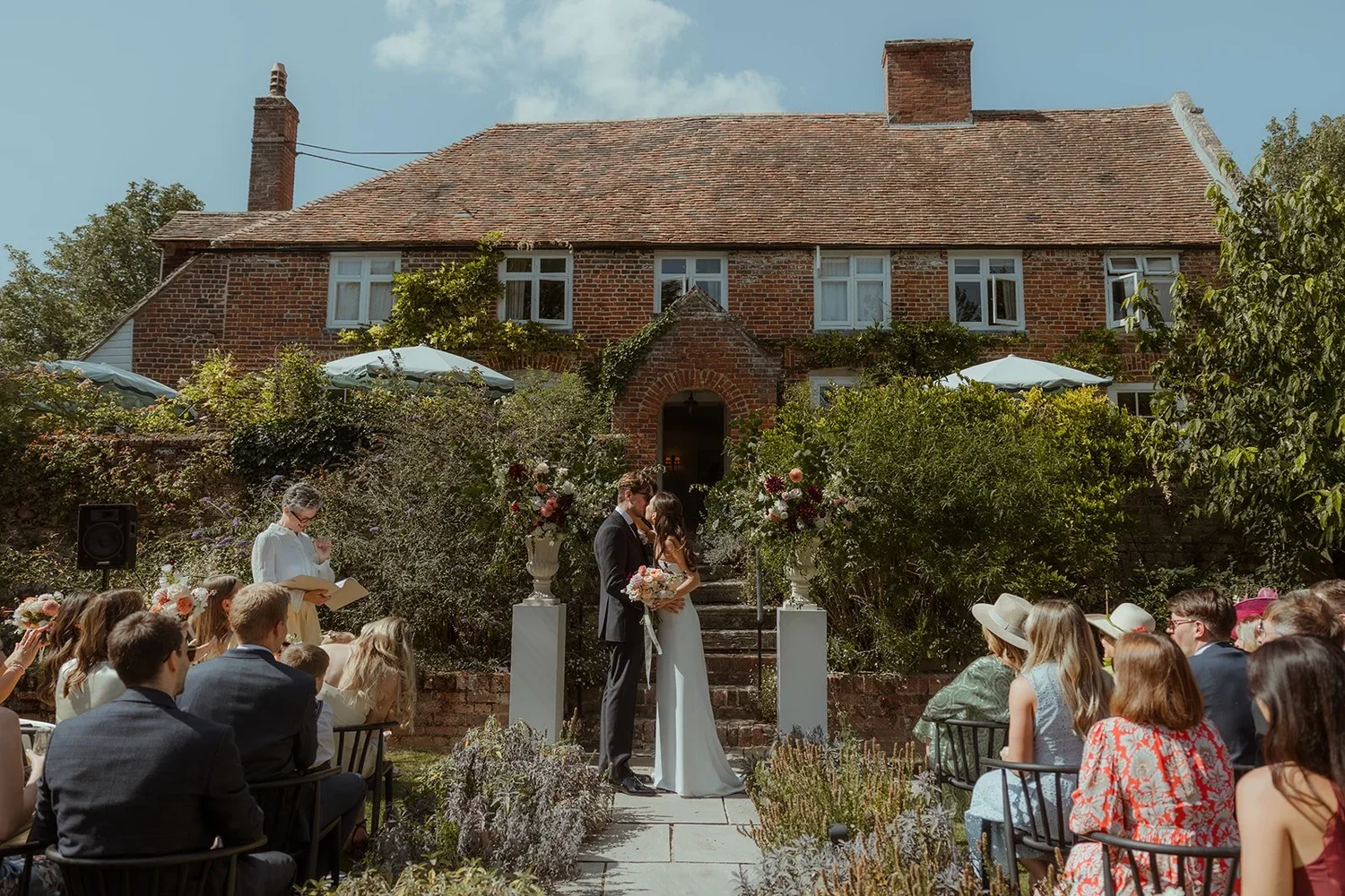 Elegant sun drenched garden ceremony at Updown Farmhouse, Deal.
