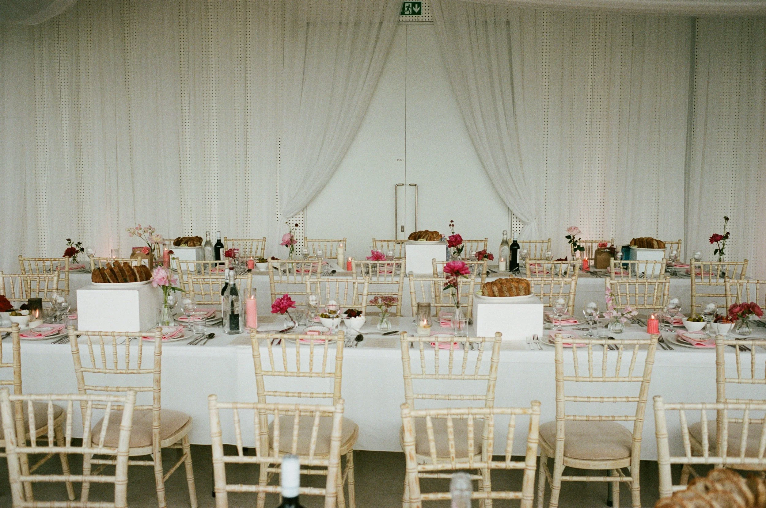 Turner-Contemporary-wedding-flowers-reception-table-bud-vases.jpg