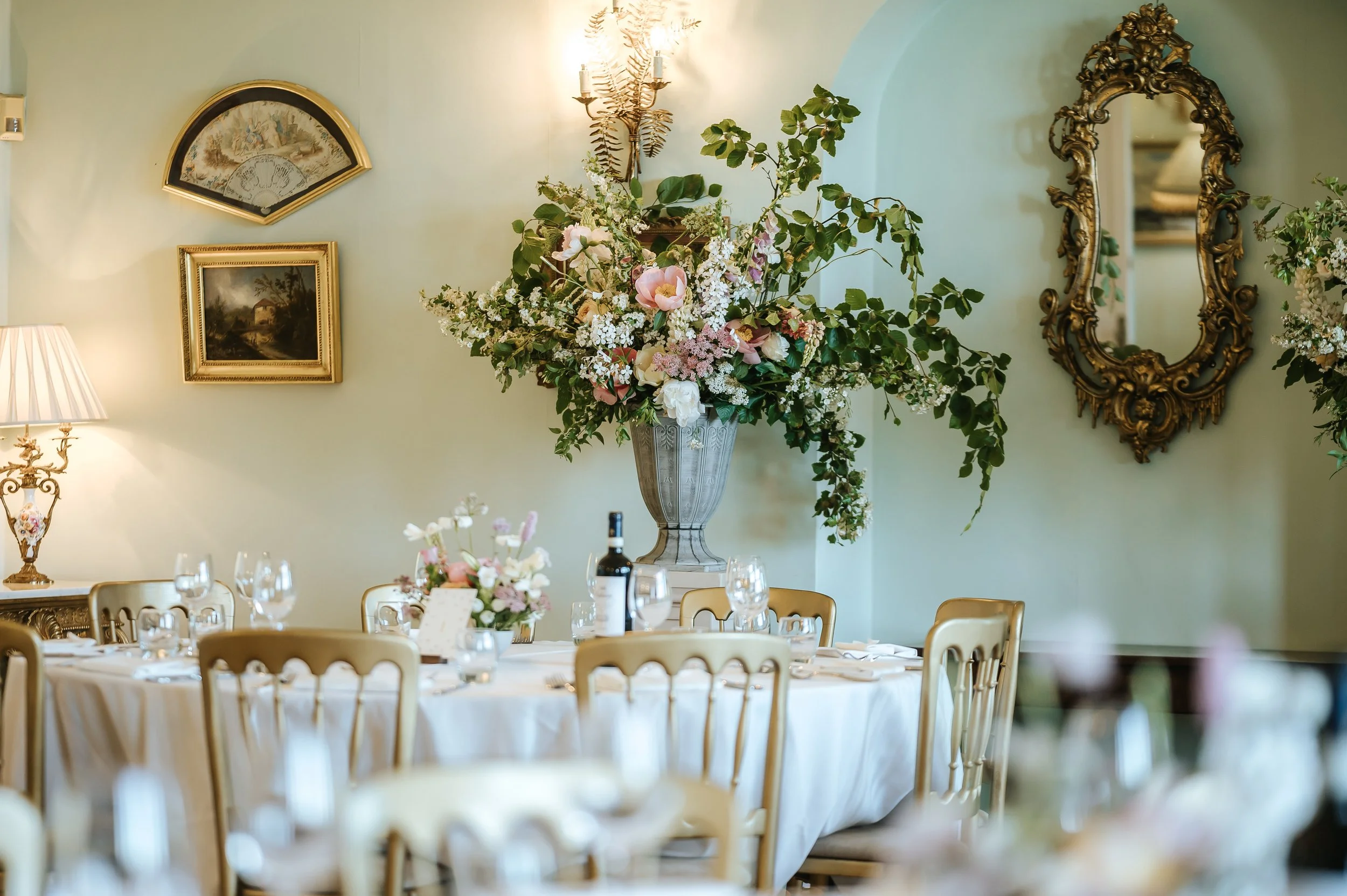 wadhurst-castle-wedding-reception-urn-flowers-table.jpg