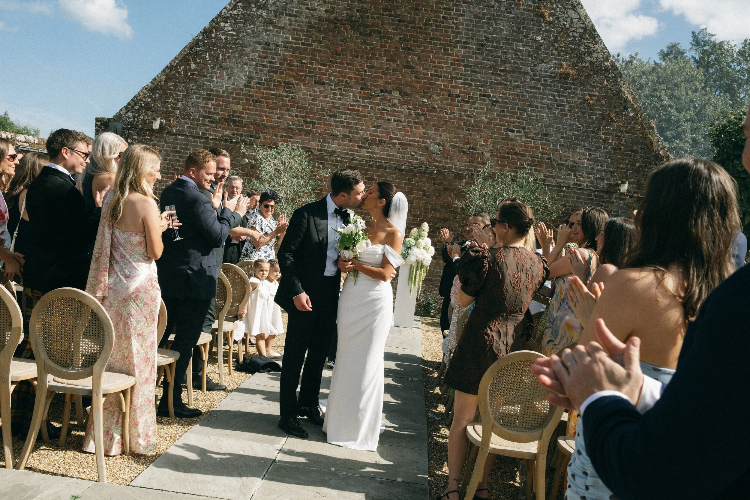 outdoor-garden-wedding-ceremony-first-kiss.jpeg