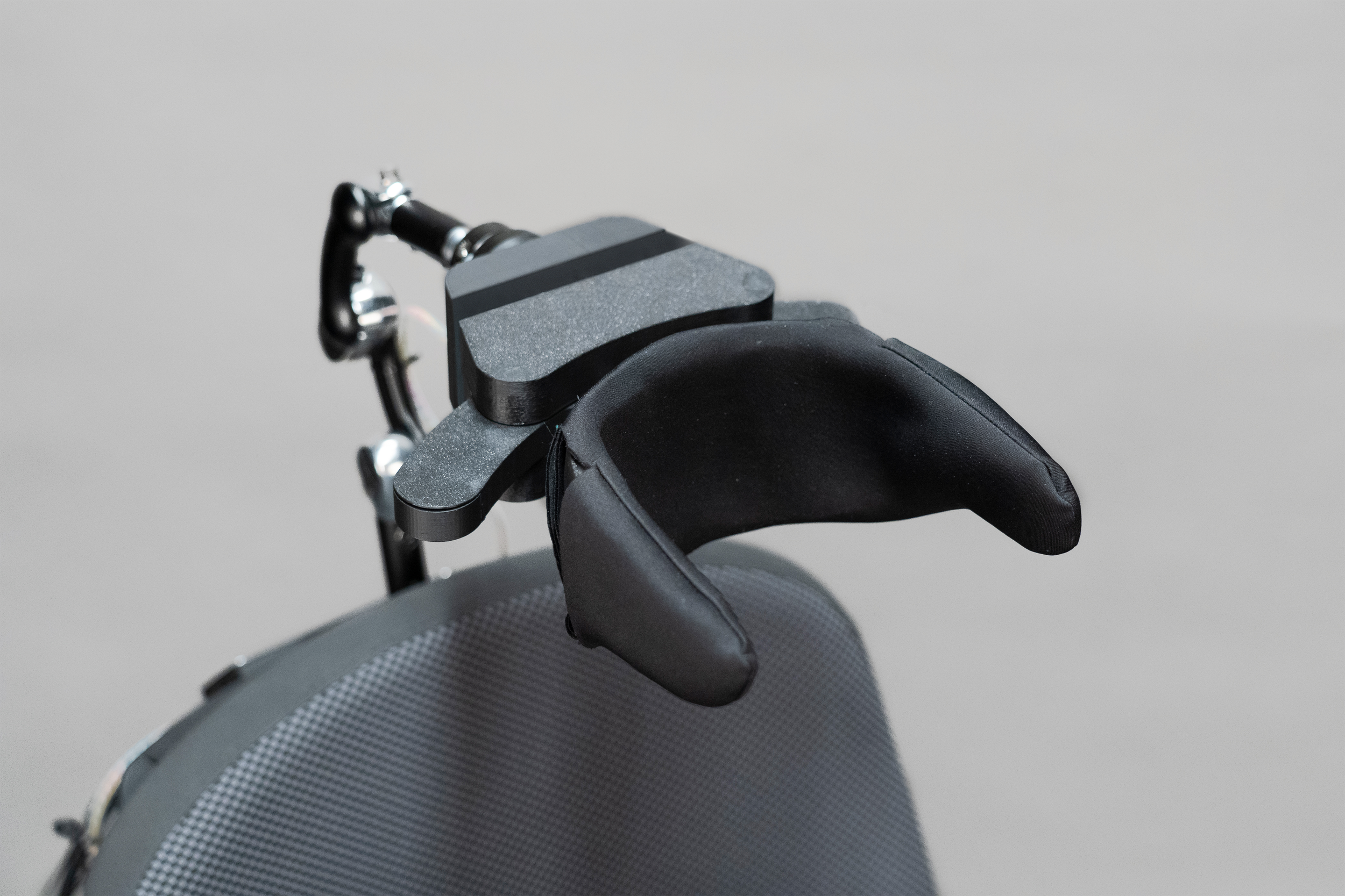 Head Control System for Powered Wheelchairs