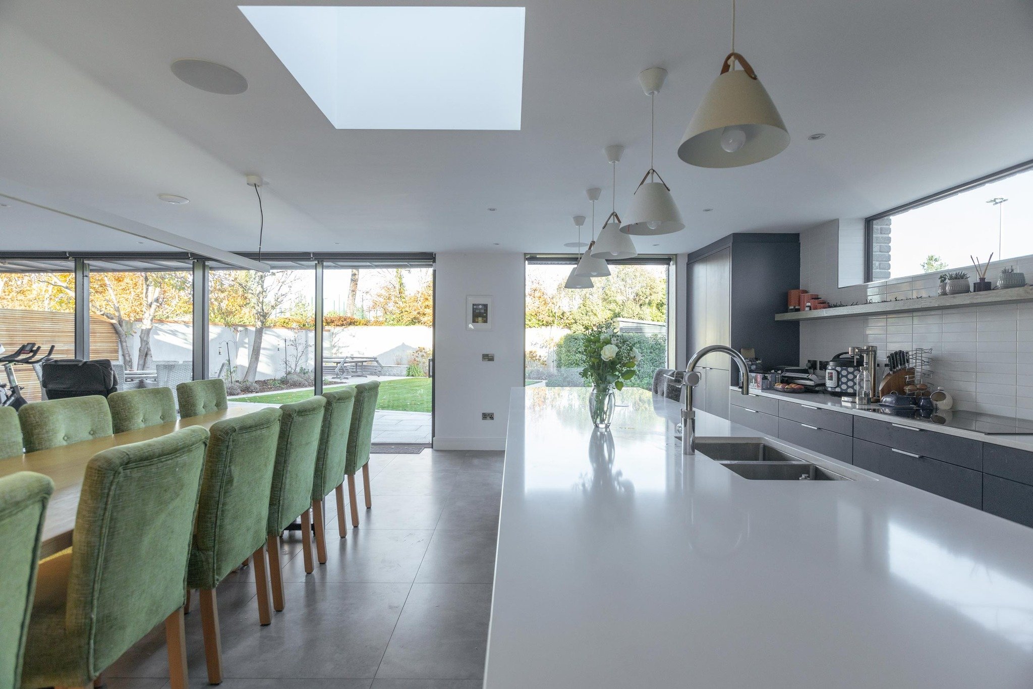 We always focus on bringing more natural light into our clients' homes when planning designs.

For this client, we chose three different types of windows for their open plan living area.

Large glass doors leading to the outside area, huge sky lights
