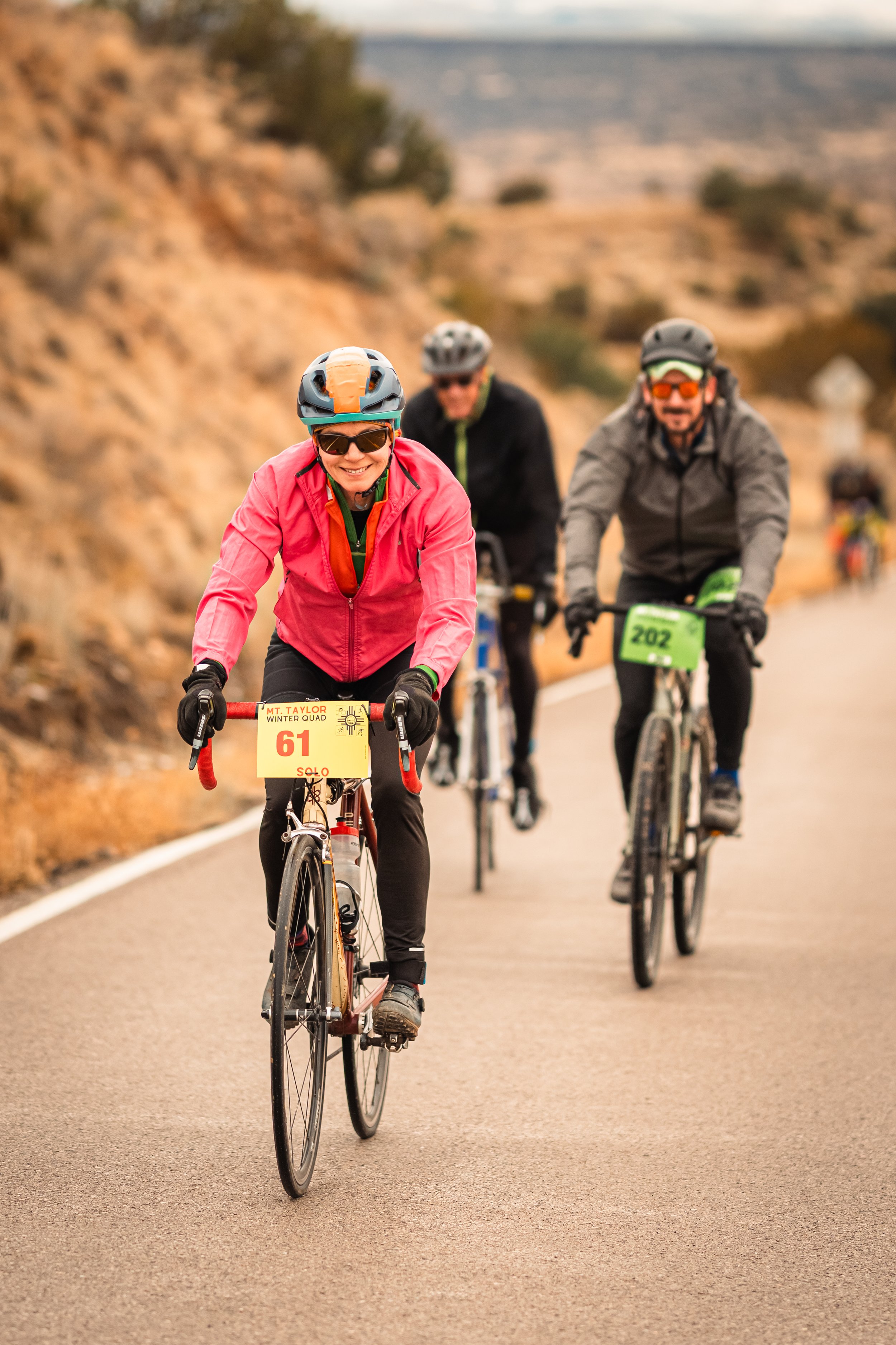 Road cyclists on Lobo Canyon Road heading out of Grants, NM.