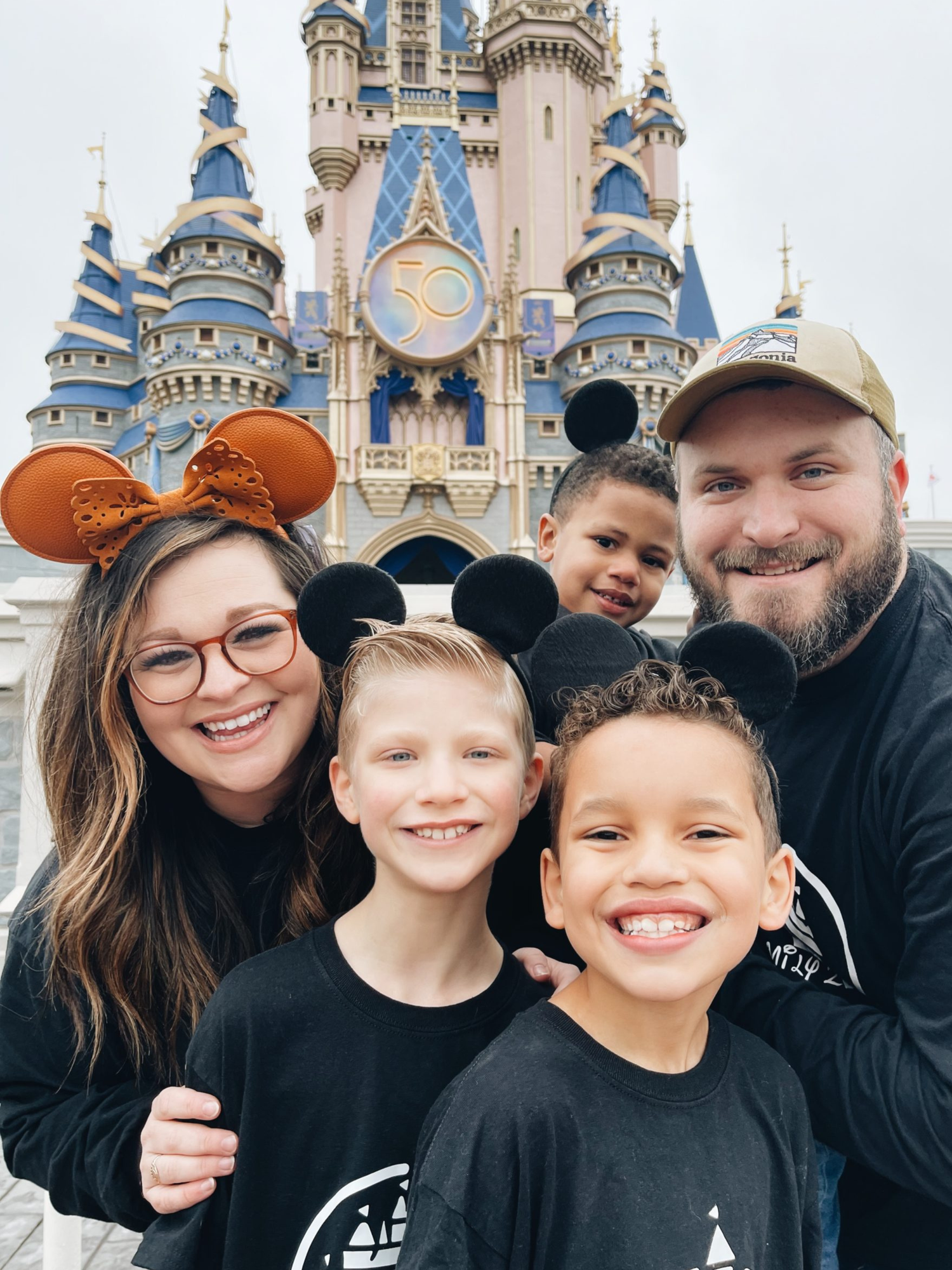 Amy's family in front of Cinderella Castle