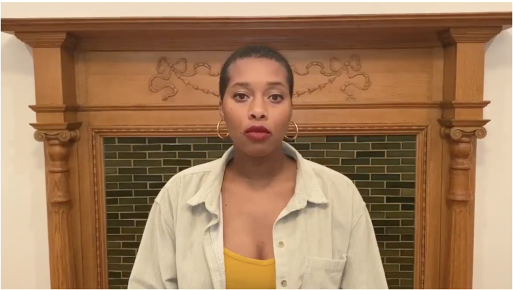 Bianca in front of a fire place