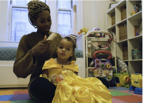 Dr. Bianca Jones Marlin brushing a child's hair
