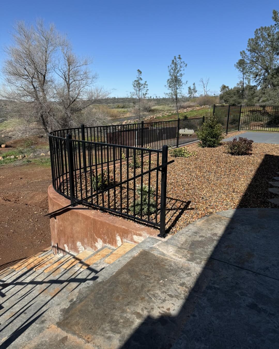 Custom radius handrail and some fencing for this new home in Paradise.