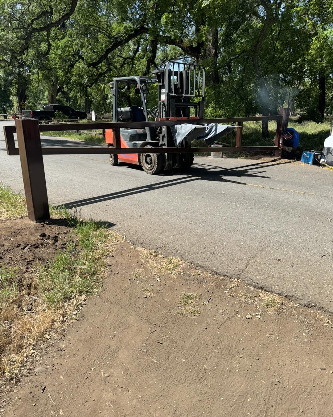 New gate going in at the park.  Those are some big posts holding a very heavy gate!