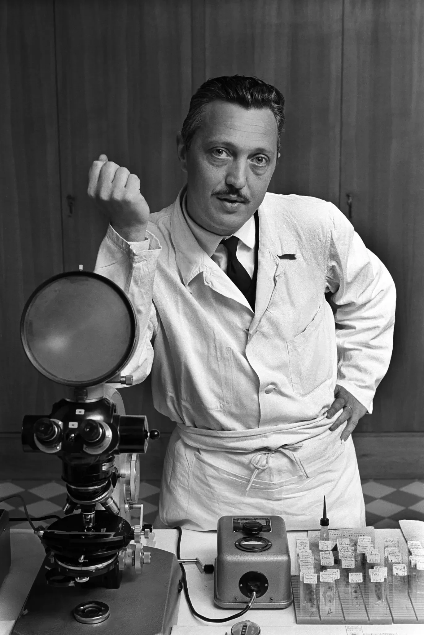 Dr. Lejeune poses with scientific equipment.