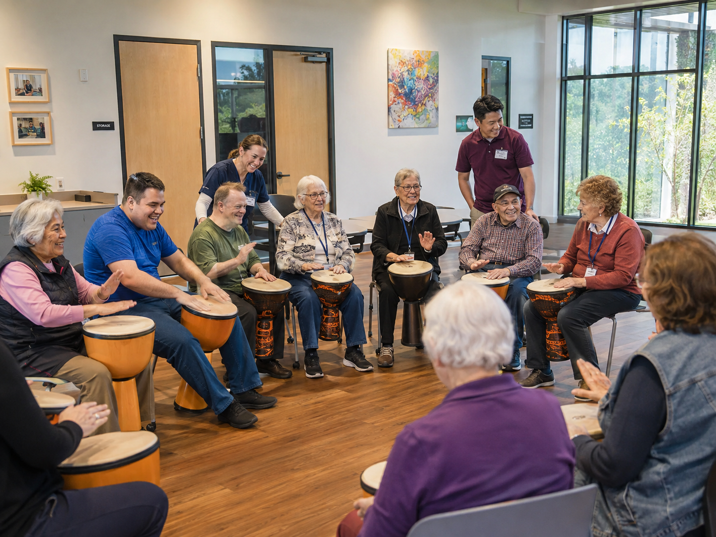 A group of seniors and residents with IDD sit in a circle playing bongos