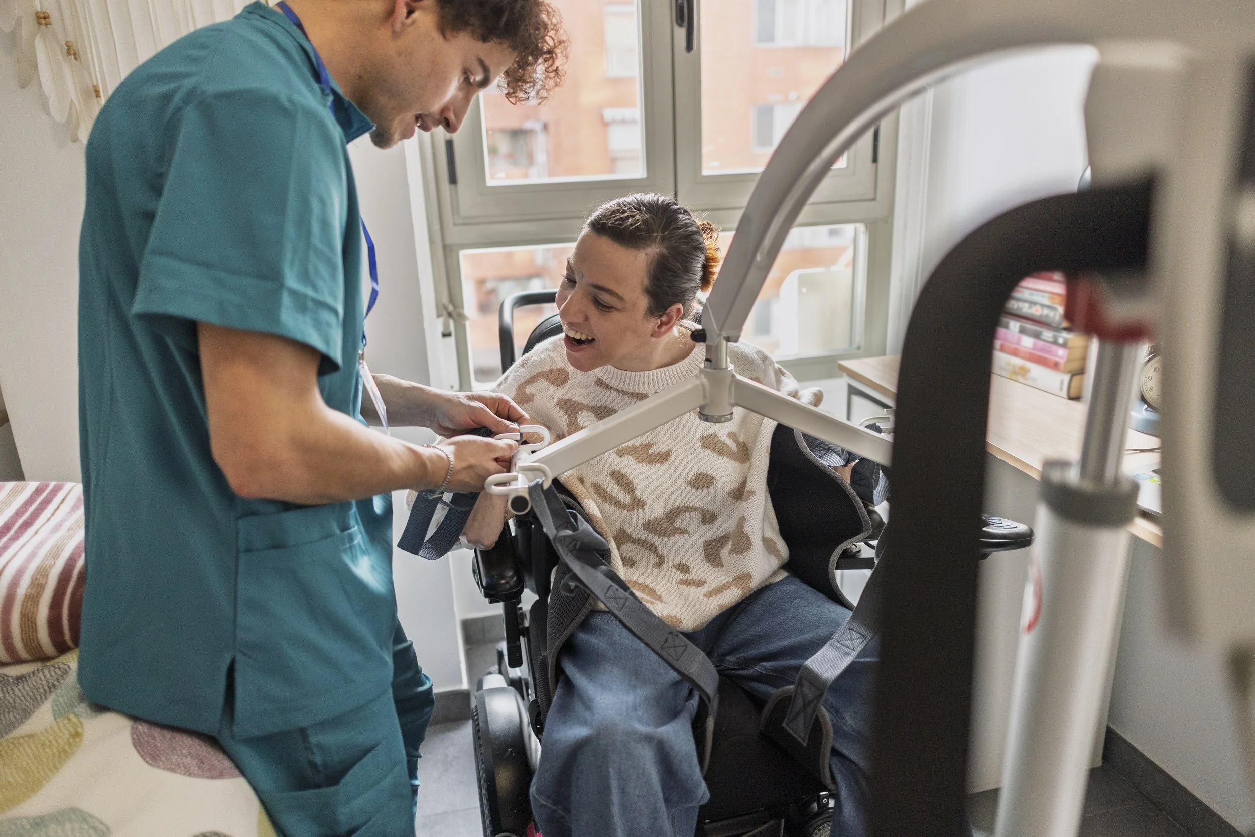 A doctor treats a woman with cerebral palsy