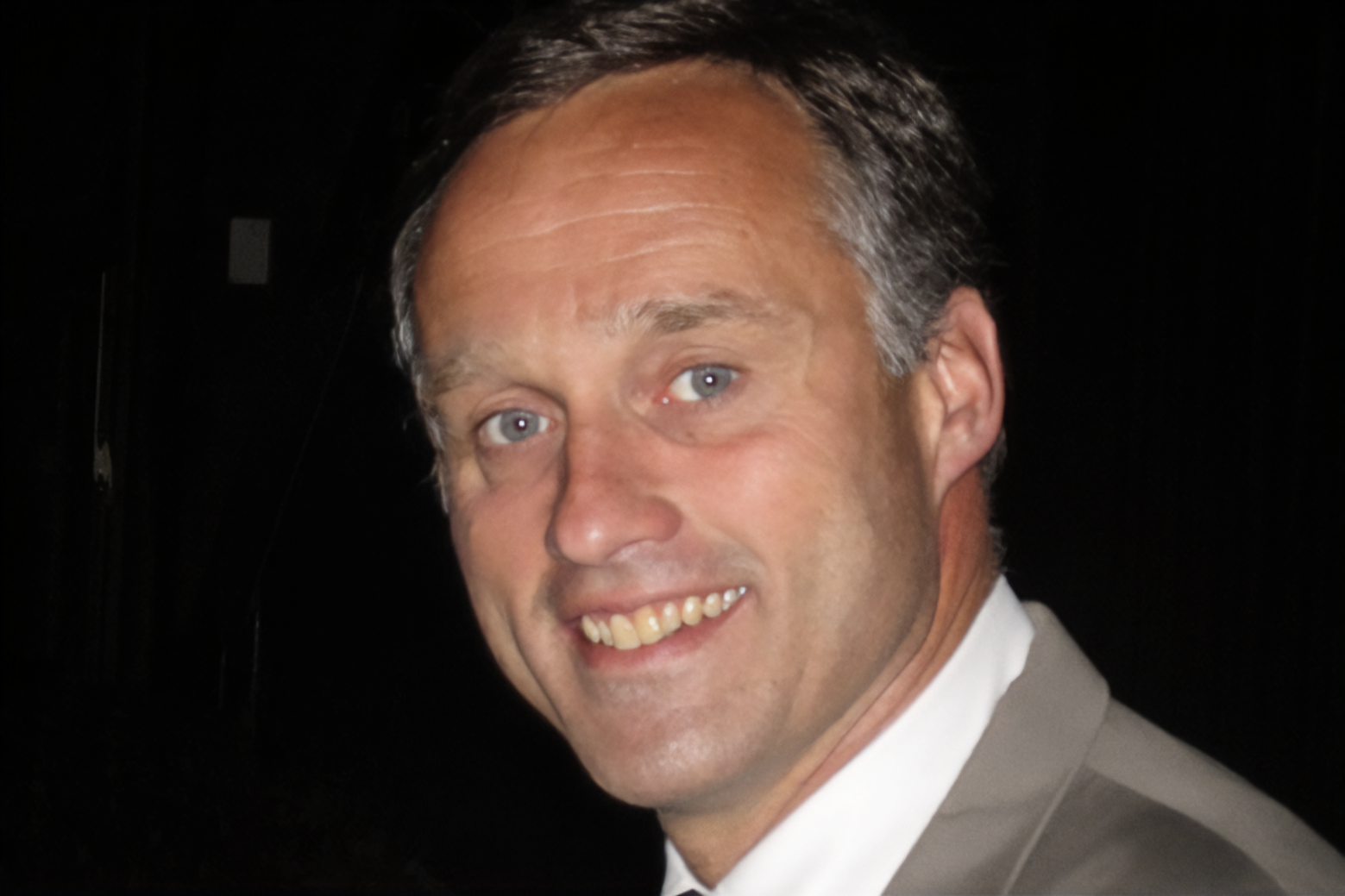 A photo of Dr. Paul Creighton, smiling