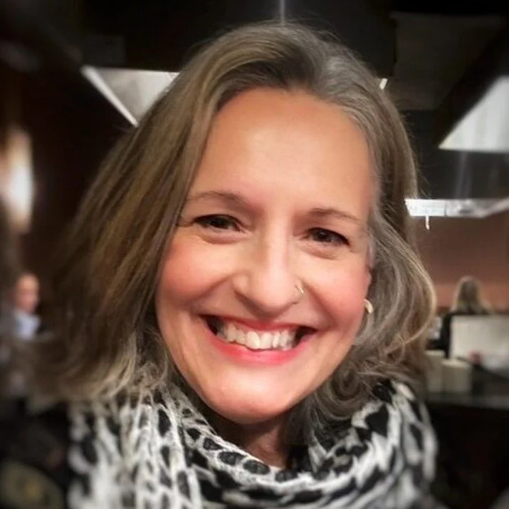 Portrait of Debbie Major with a big smile on her face