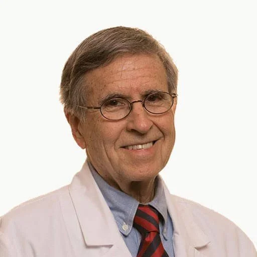 A portrait of Dr. Philip May