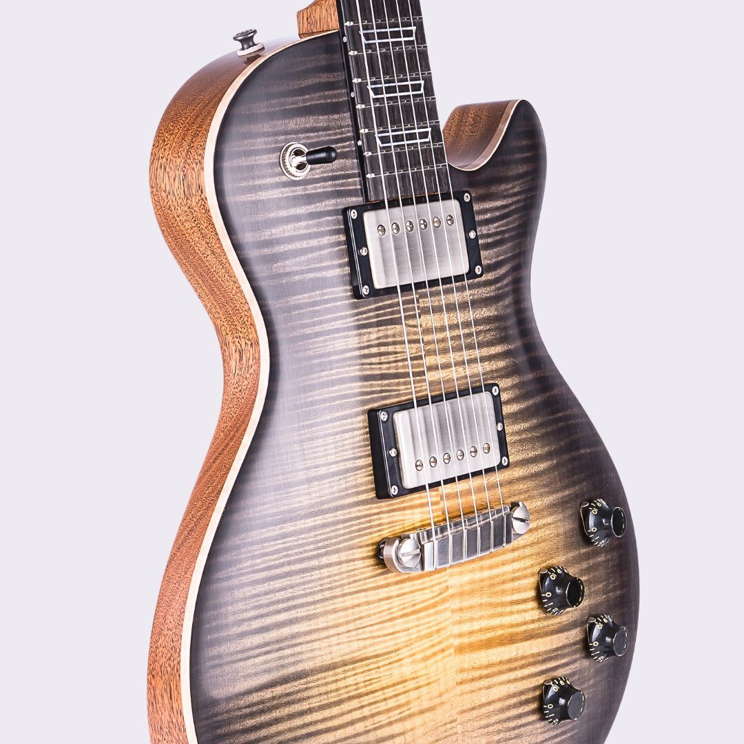 Last year, we had this stunning Patrick James Eggle Macon Carved Top in our studio for product photography. Check out our website for more details on our ship and shoot service 🤘 #websitedesign #guitarphotography #digitalmedia #guitar #guitarmarketi
