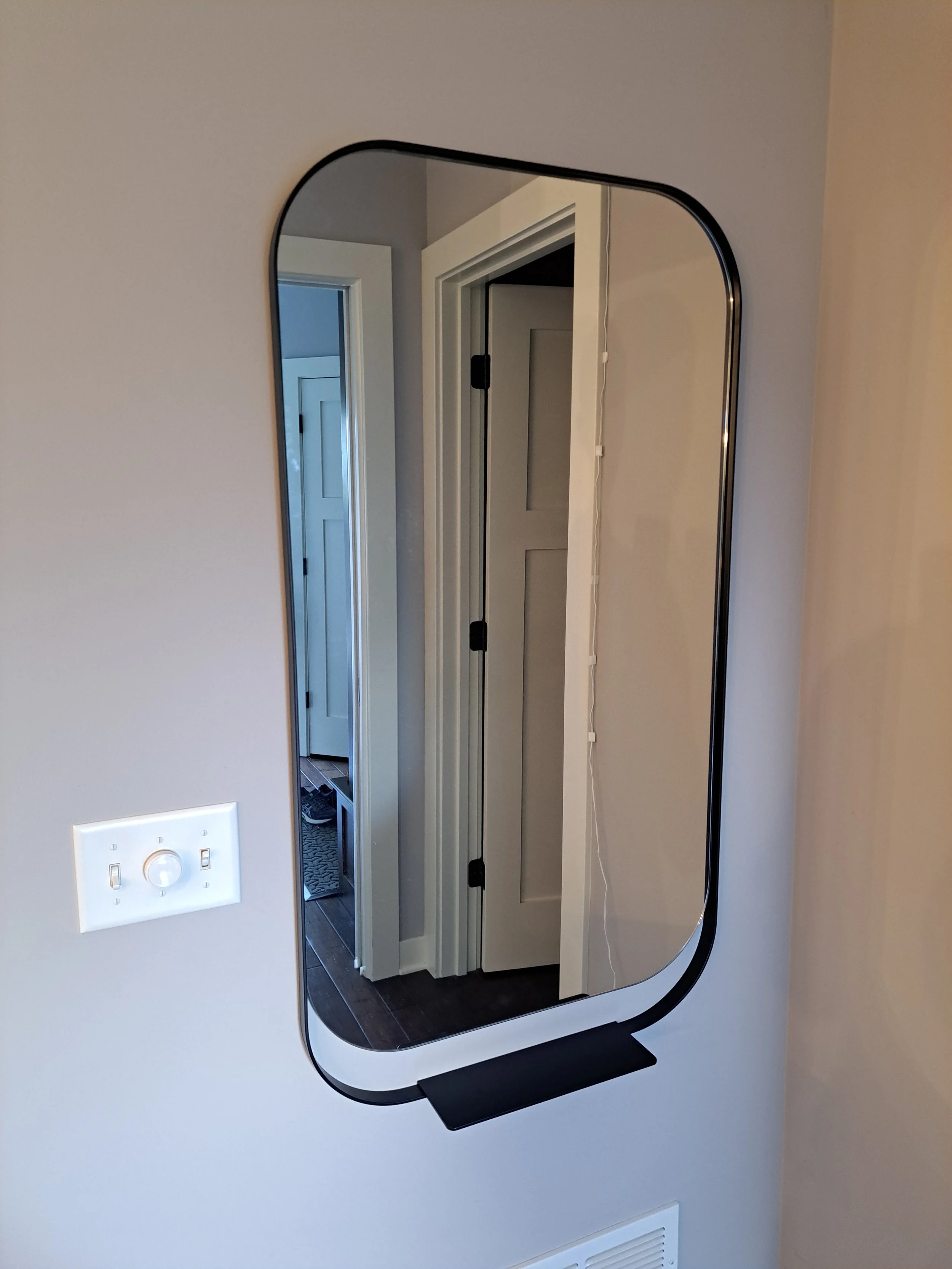 entryway mirror in new home