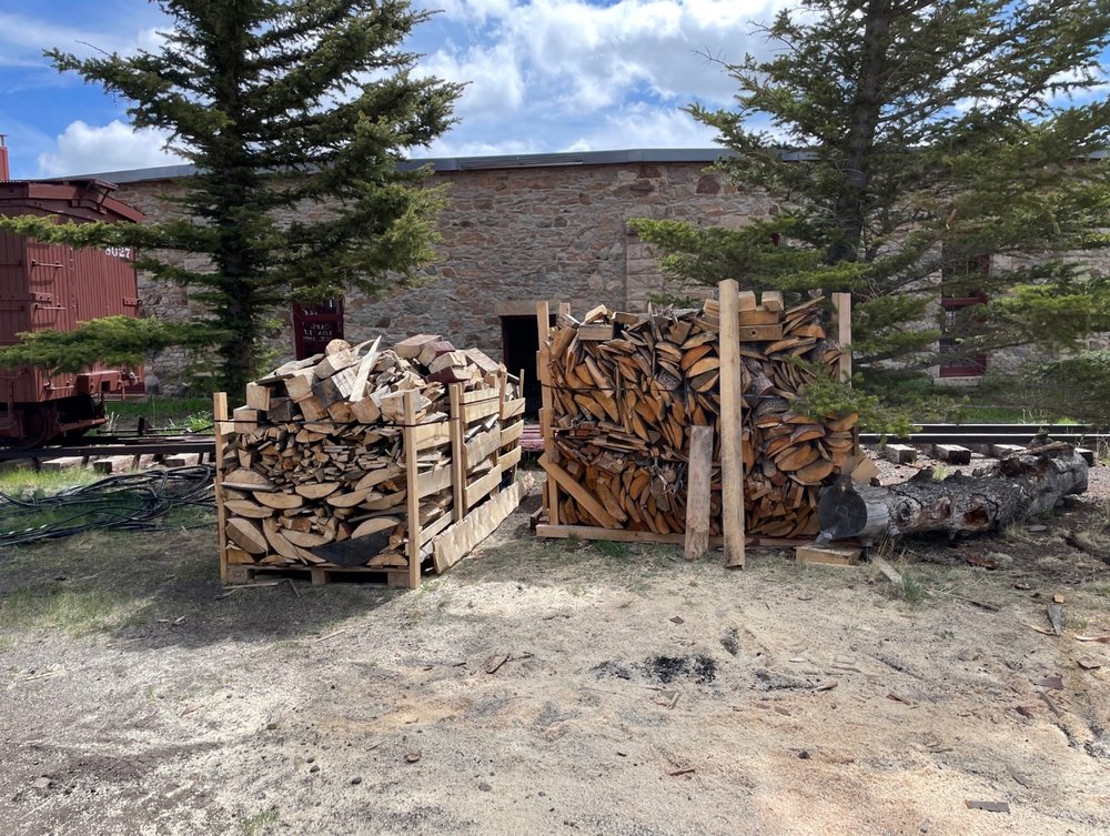  Jon Dierksheide and Tom Lawson cleaned up lumber trimmings from water tank milling of planks producing future Roundhouse firewood and palletizing for logistics 