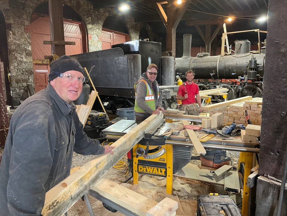  Chris Tome, Bob Revis and Nick Holt continued milling water tank staves 