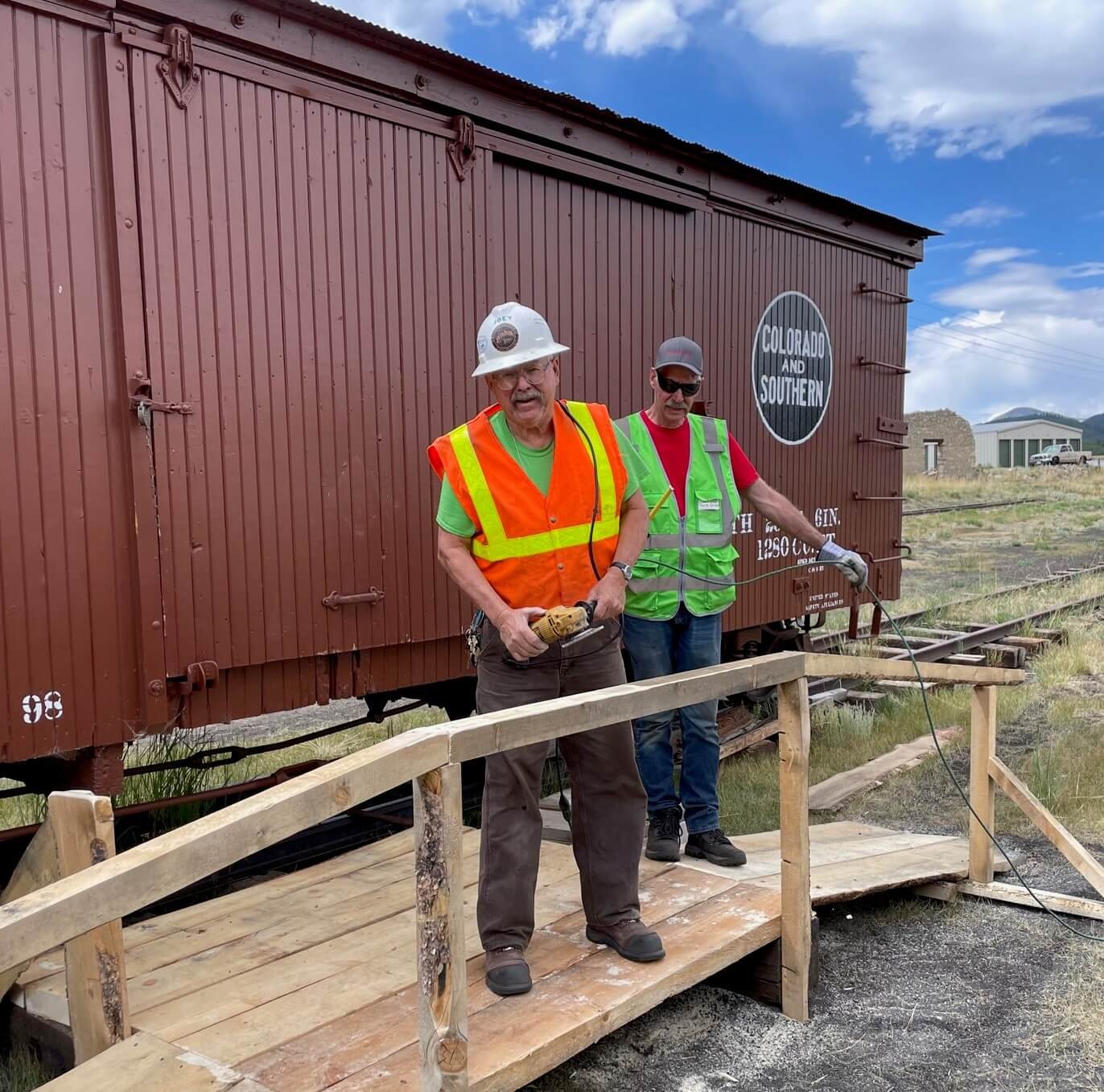  Further work continued to enhance visitor experience of archeological history on the Como Heritage site with Joey Knous and Clark Stemke constructing a visitor ramp to view the archival collection and the relocation of C&amp;S Boxcar #8027under the 