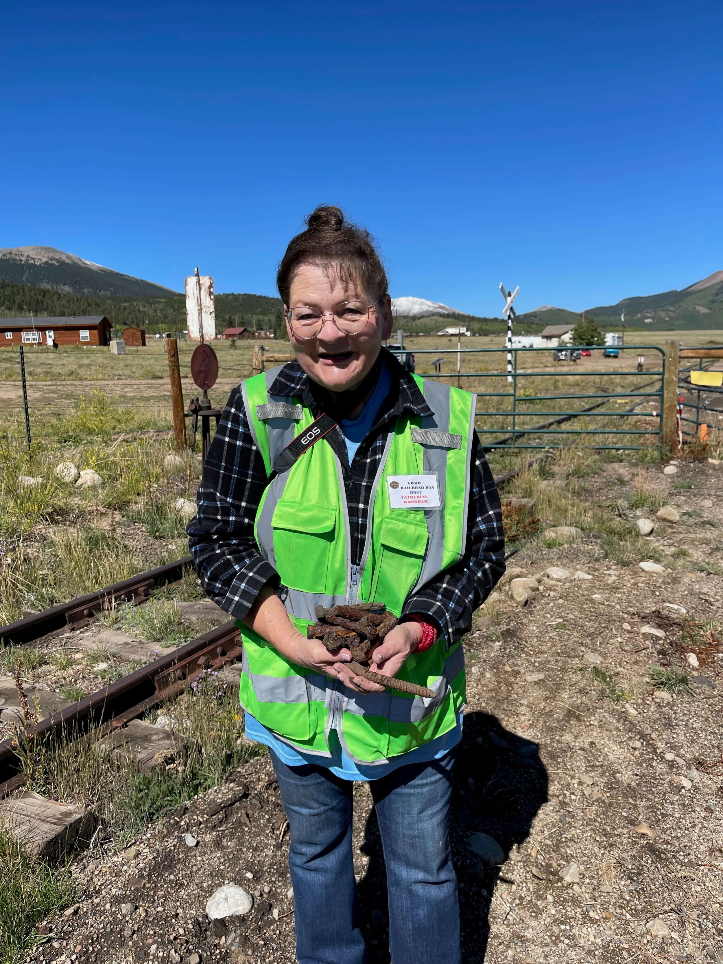  Resident archeologist Catherine displays her “loot” of artifacts to display at the archeological boxcar on the Como Campus.  