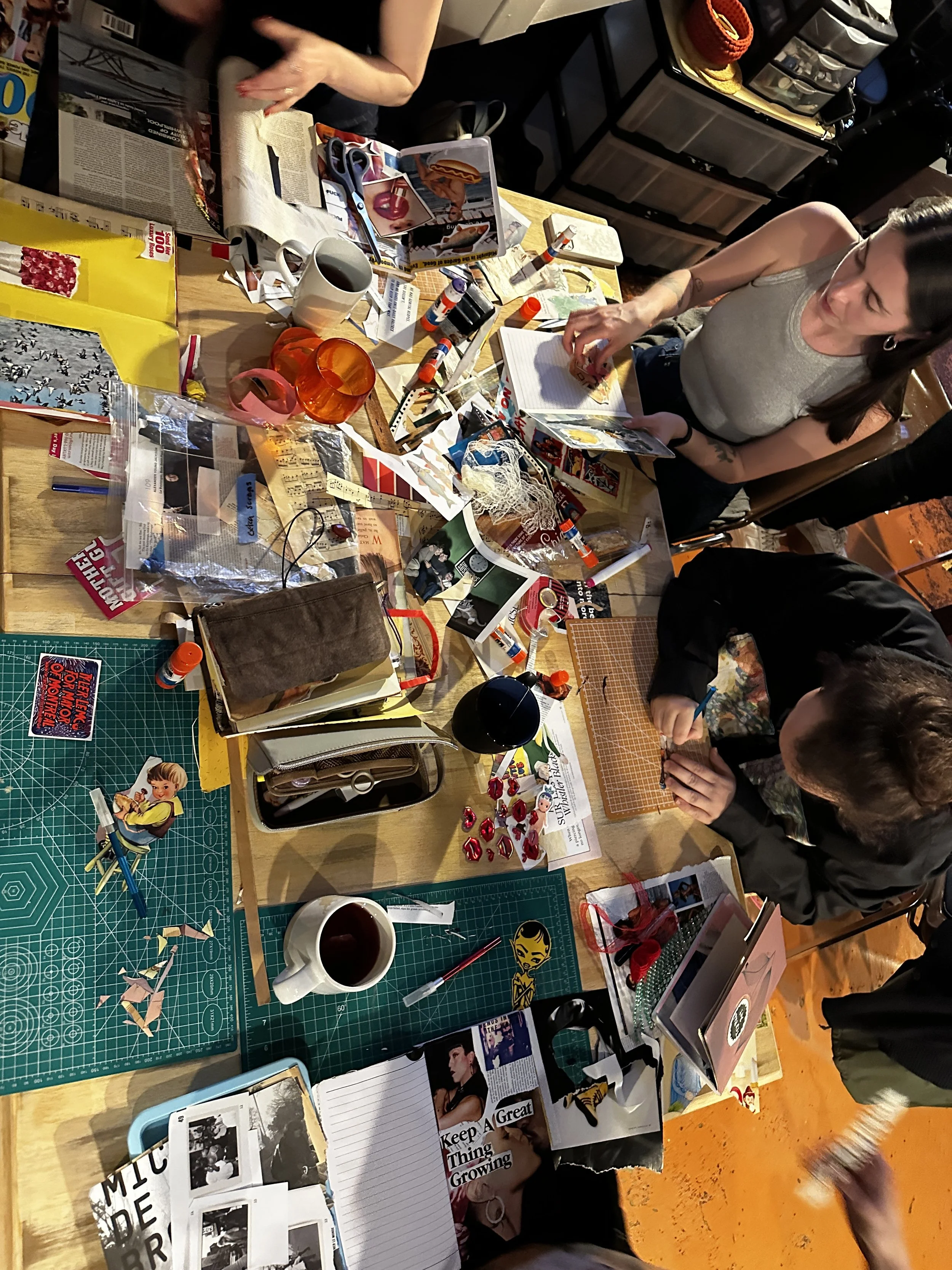 Overhead shot of people making junk journals.