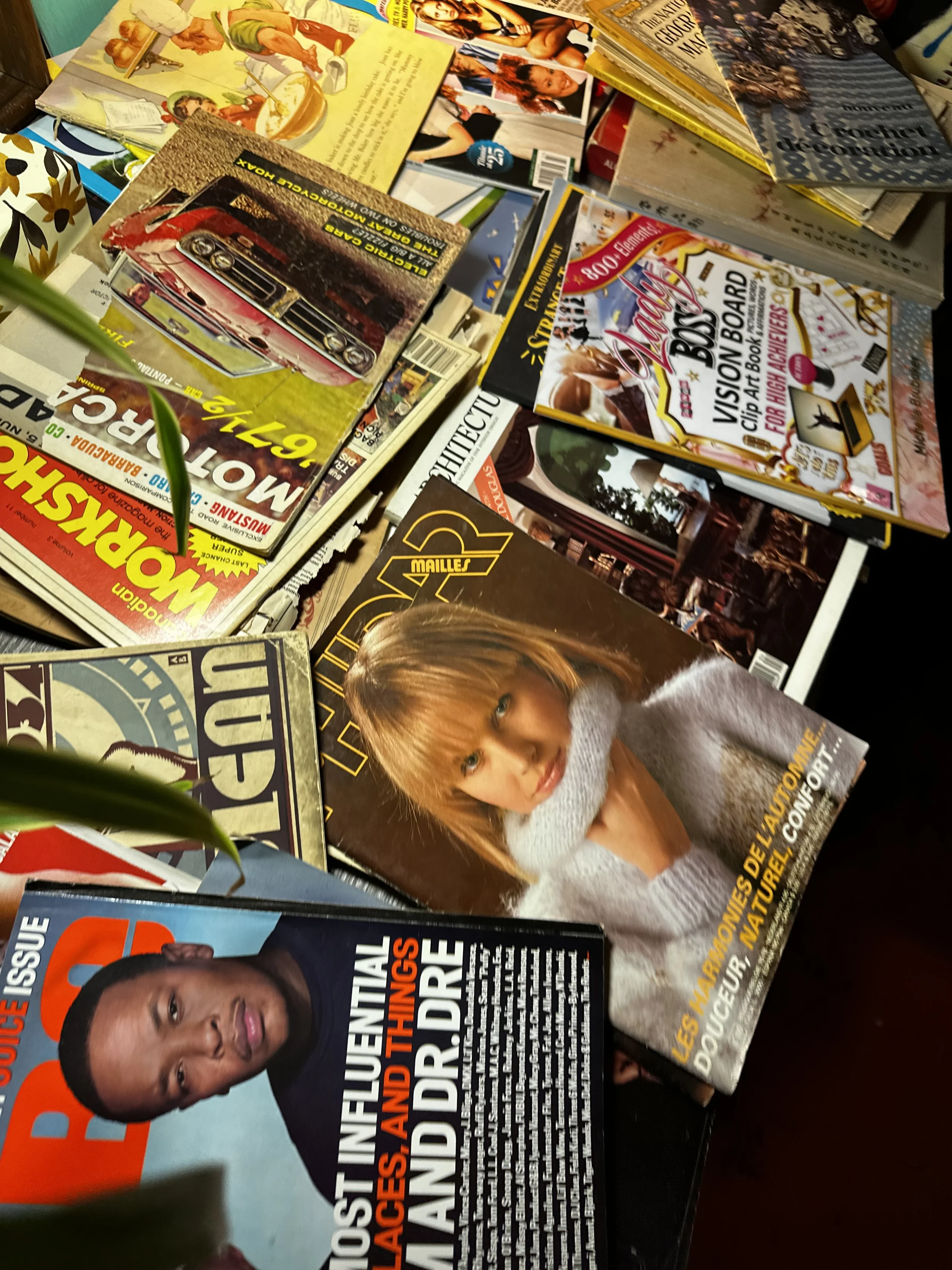 A table full of collage magazines.