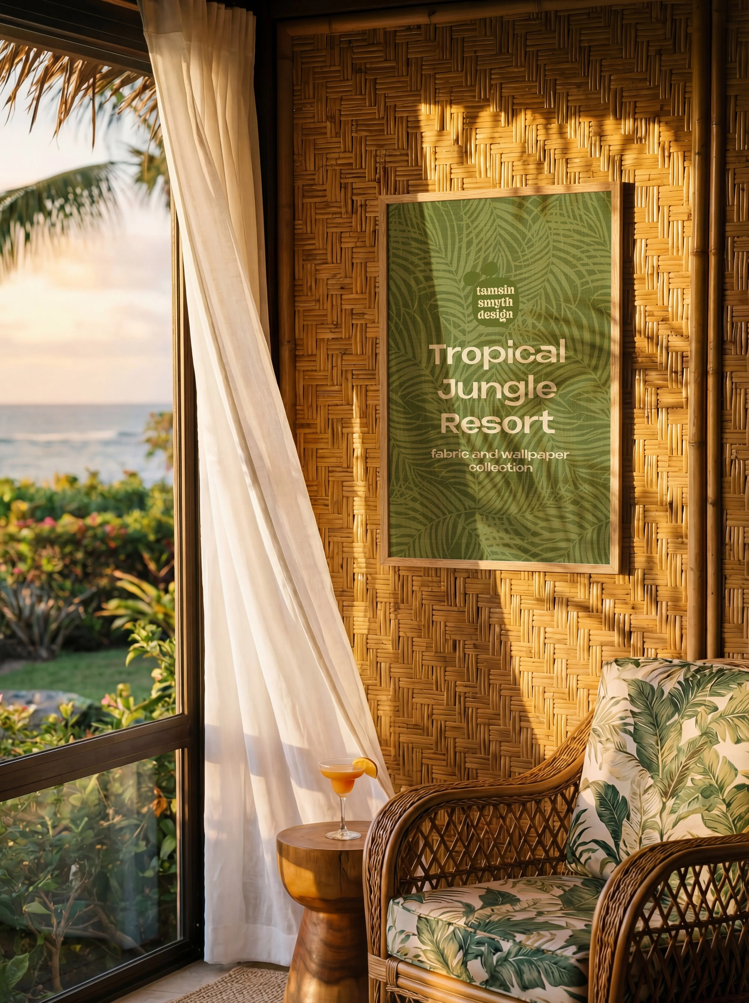 A coastal cabin sitting room in a tropical setting with a thatched wall featuring a poster which reads “Tamsin Smyth Design Tropical Jungle Resort fabric and wallpaper collection"