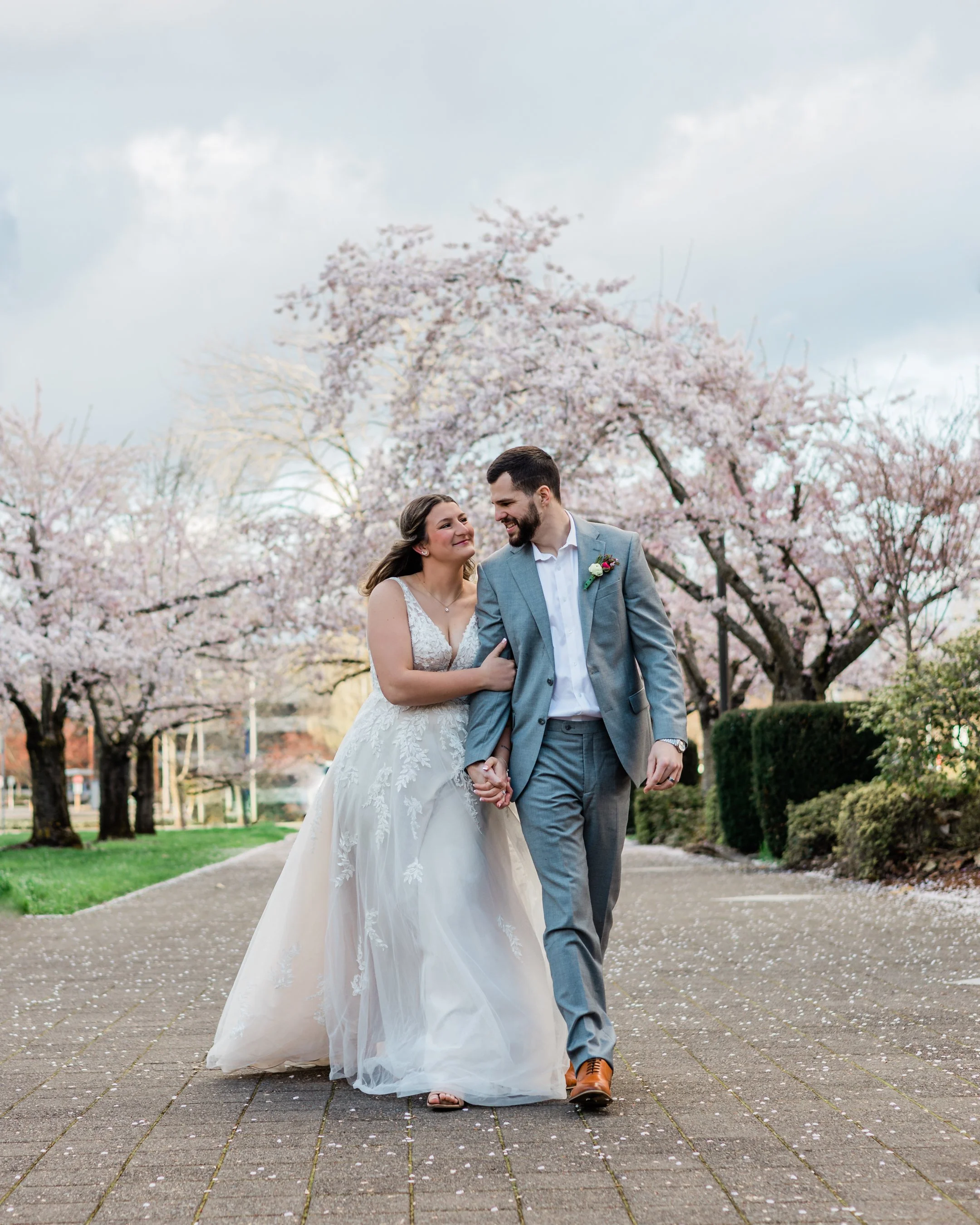 bride_and_groom_in_cherry_blossoms_in_salem-1.jpg